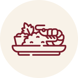 Illustration of a plate with various foods including a shrimp, rice, and a leafy vegetable.