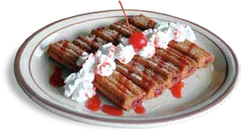 Strawberry-topped waffle with whipped cream on a plate