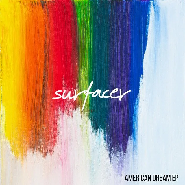 Colorful rainbow paint strokes with the word 'suffer' written in white and 'AMERICAN DREAM EP' in black text. Surfacer
