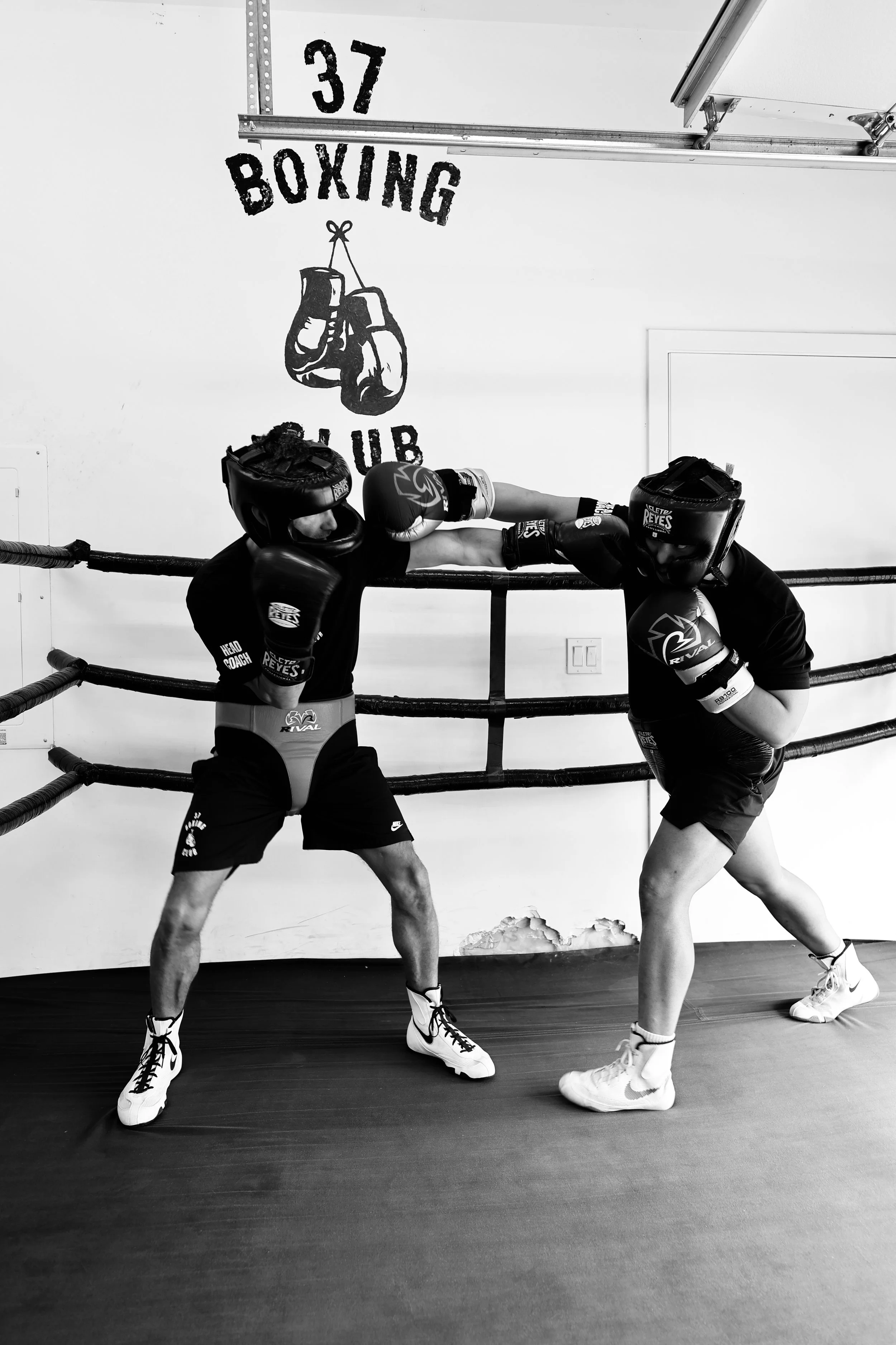 Coaches Rich and Jimmy sparring in the ring at 37 Boxing Club in Tsawwassen BC