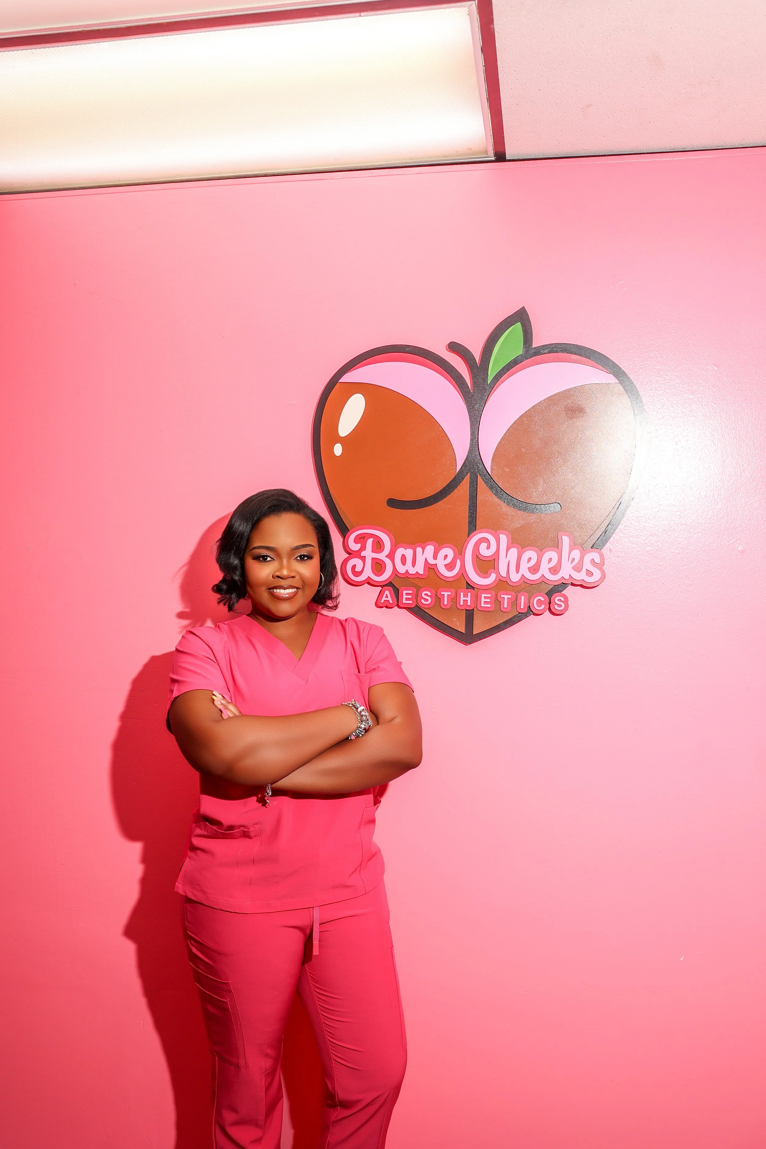 Portrait of JoJo, waxer and founder at Bare Cheeks Aesthetics