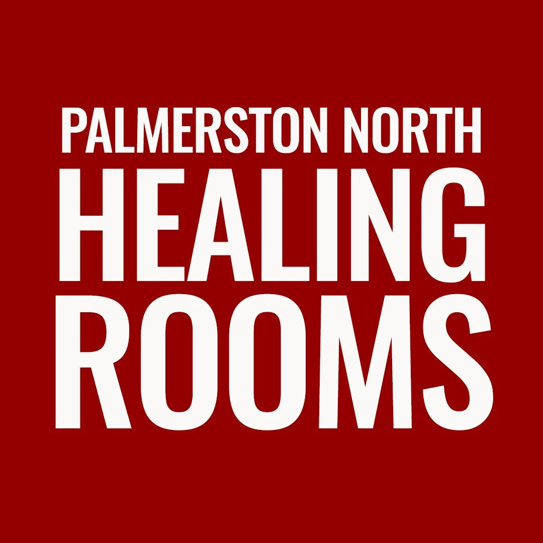 Red background with white text reading 'Palmerston North Healing Rooms'.