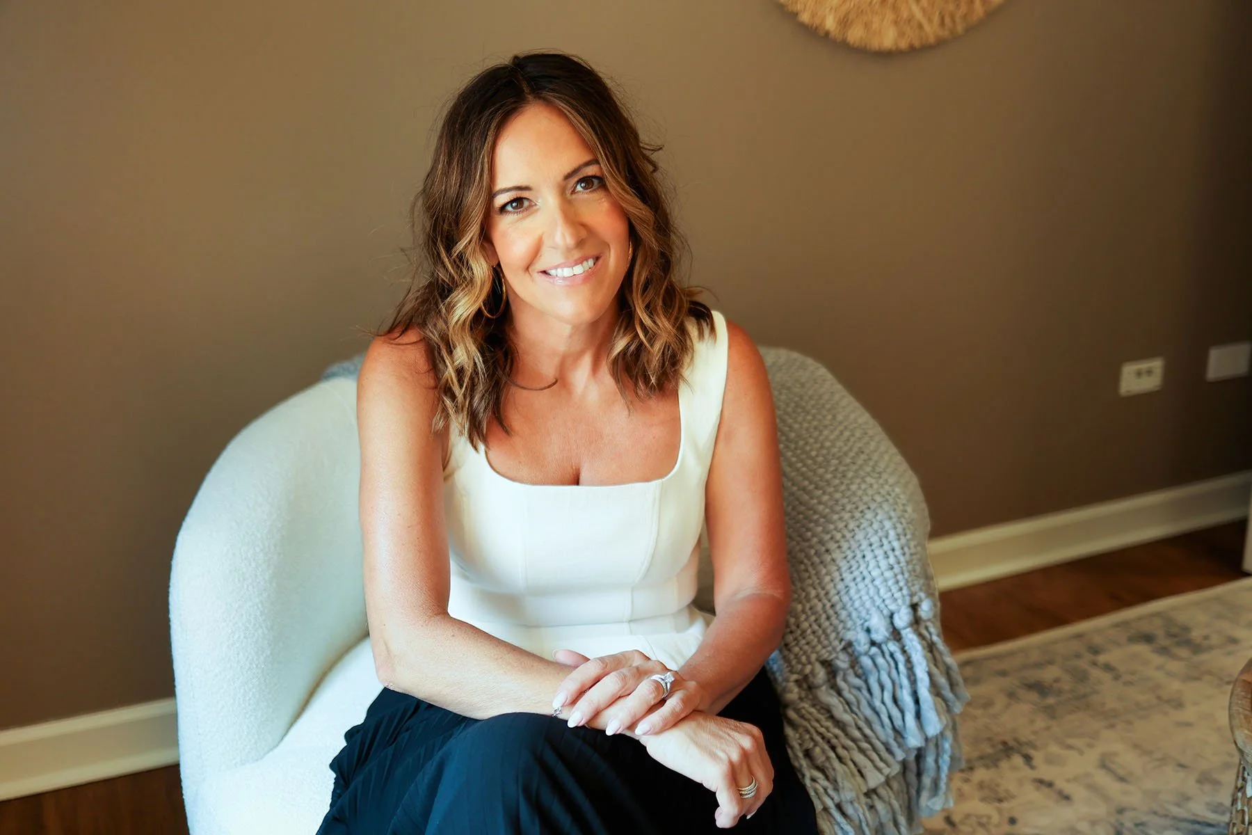 Maria Bullion, women’s therapist in Frankfort, Illinois, photographed in her warm counseling space.
