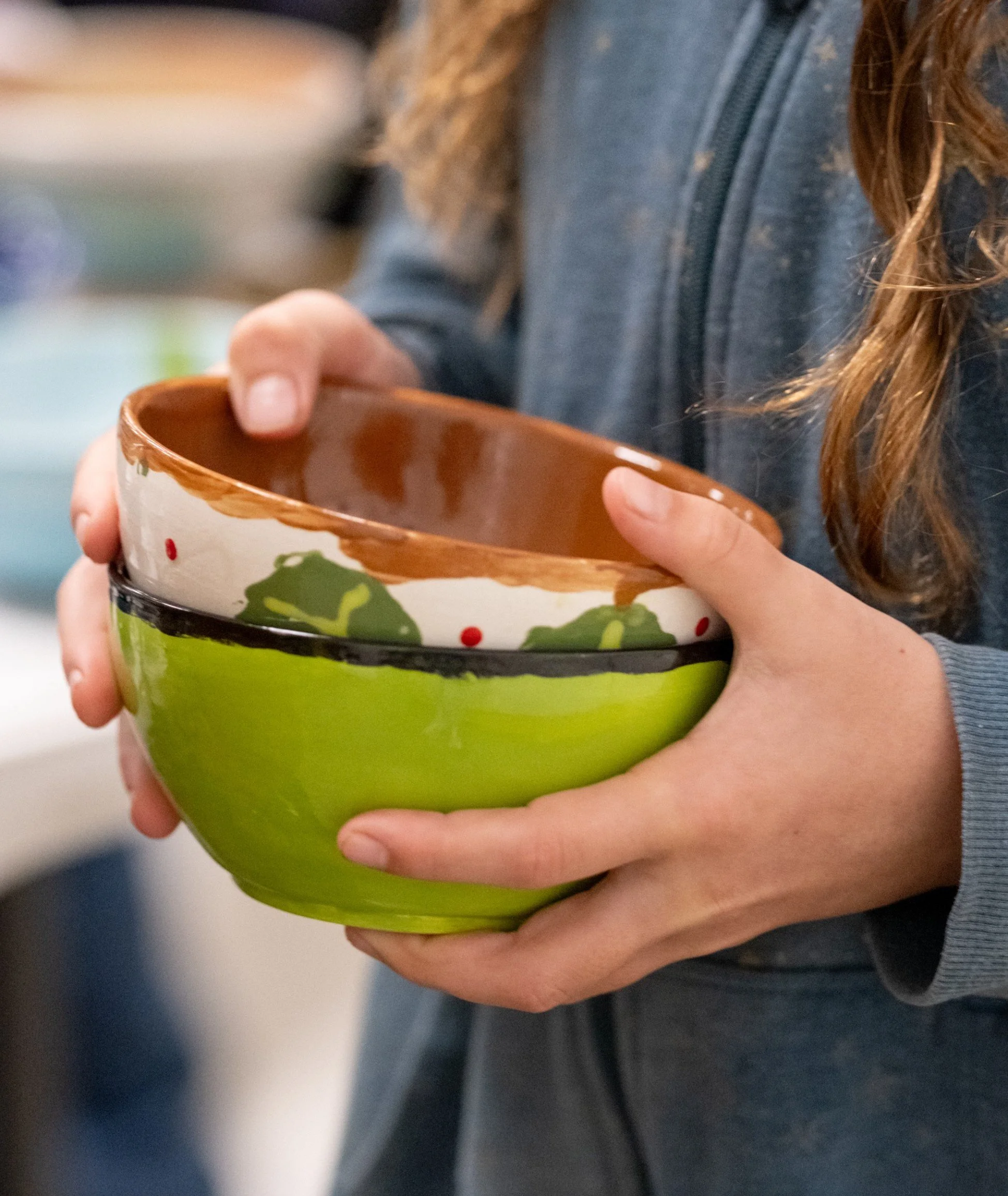 Guests picking out their bowls for the Austin Empty Bowl event. Always the Sunday before Thanksgiving.