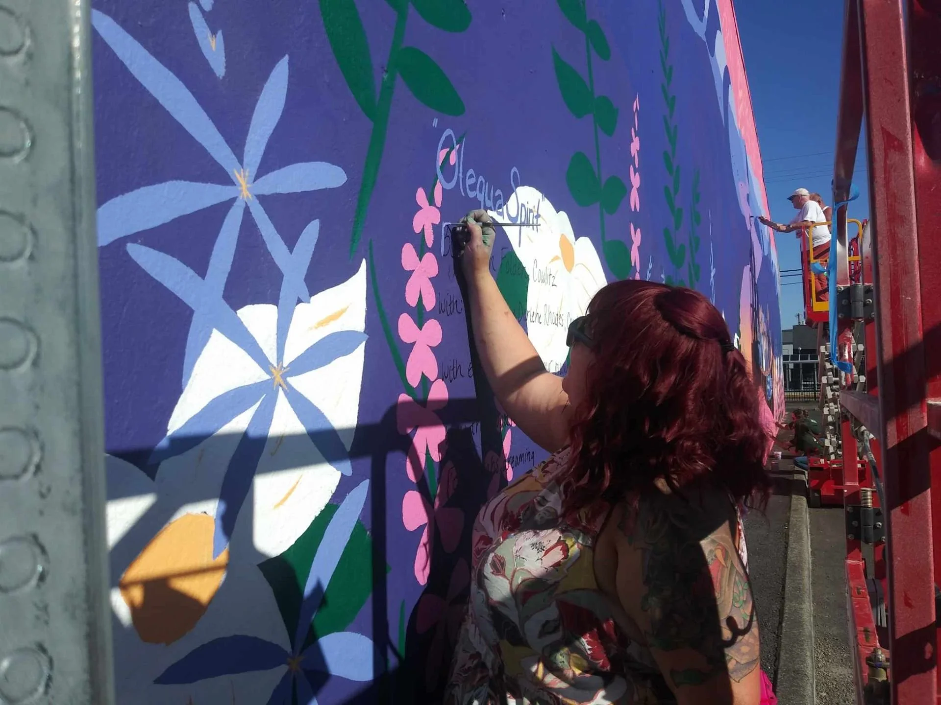 Sarah Folden (Cowlitz), Grantee, working on mural in Long View, WA