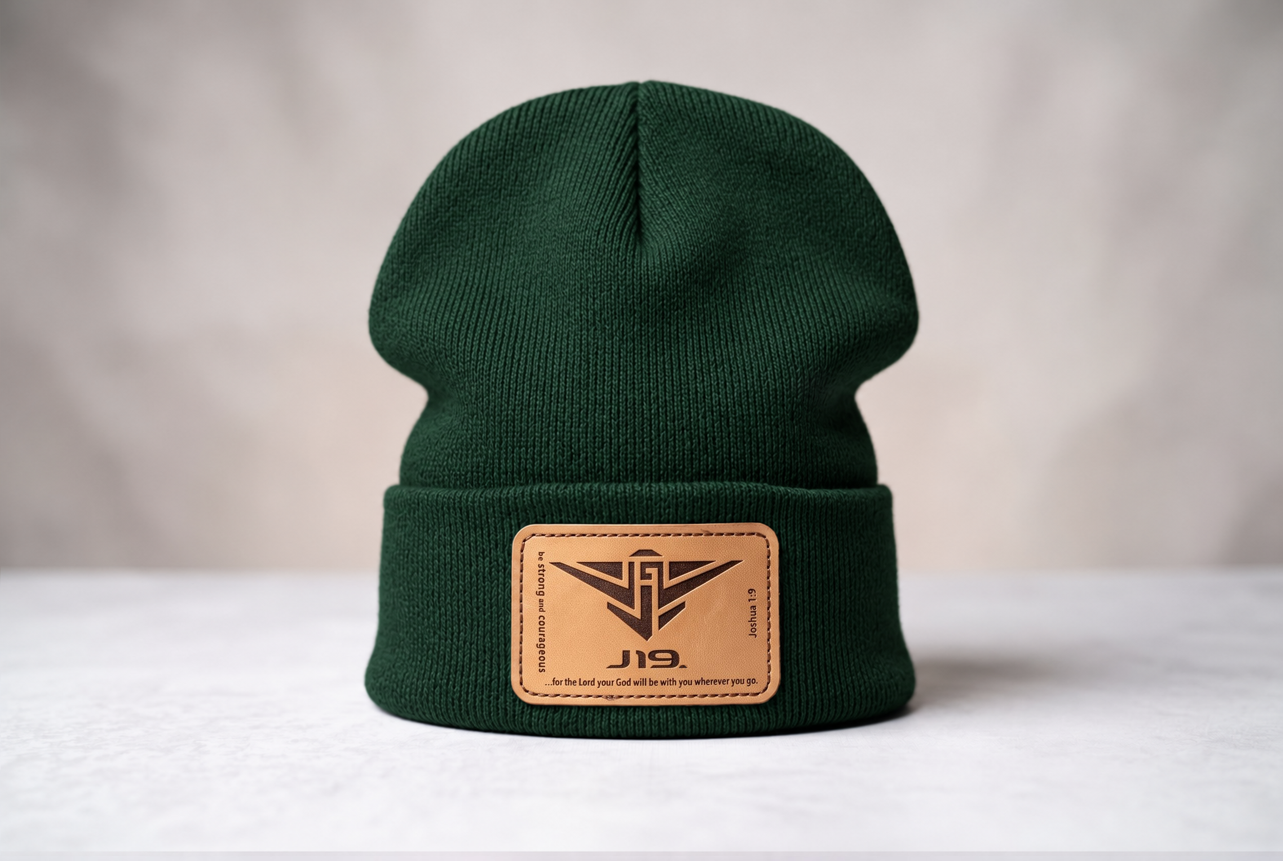 Forest Green Beanie with Leather Patch.png