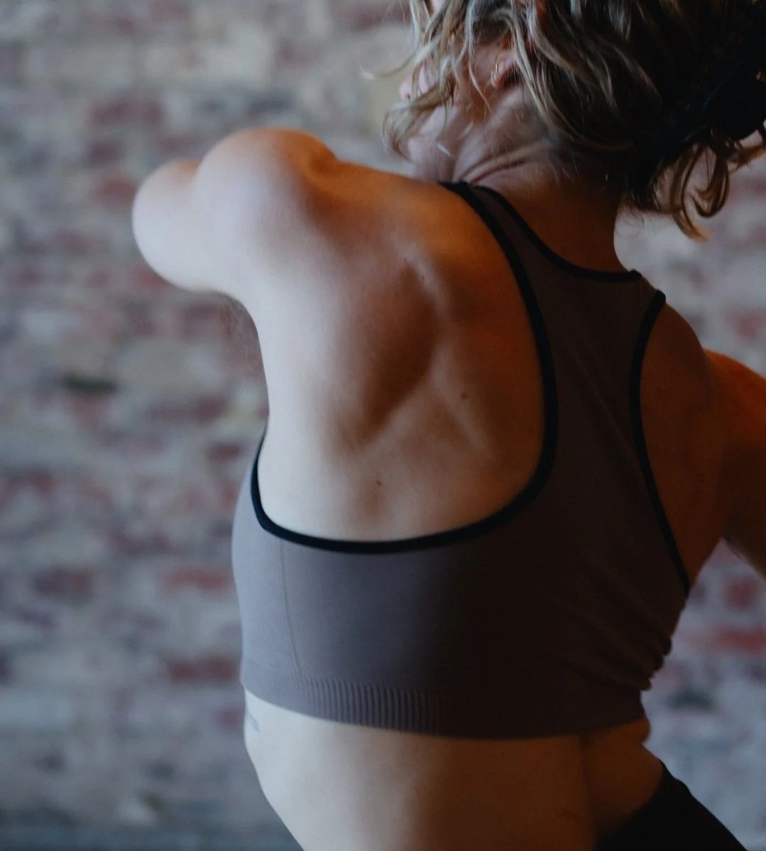 A close up of a womans back
