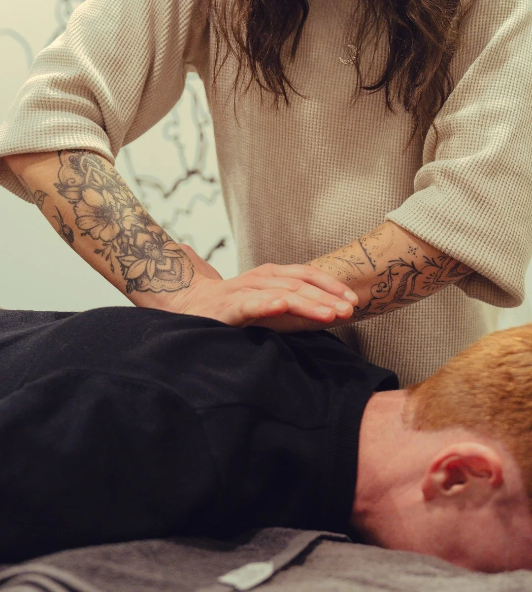 a physio treats a client