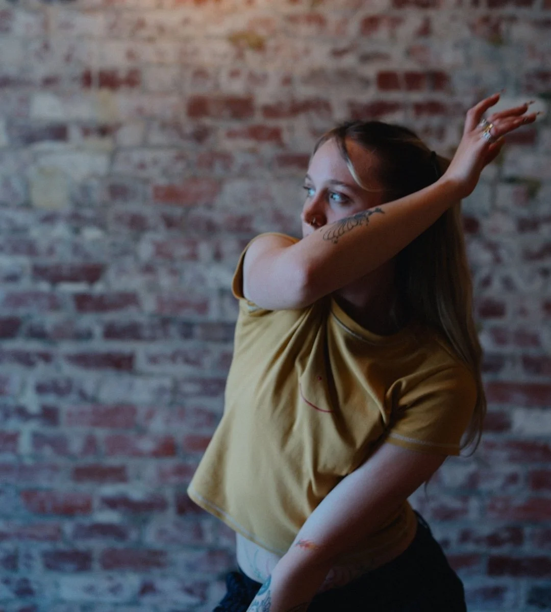 a woman moves her arms