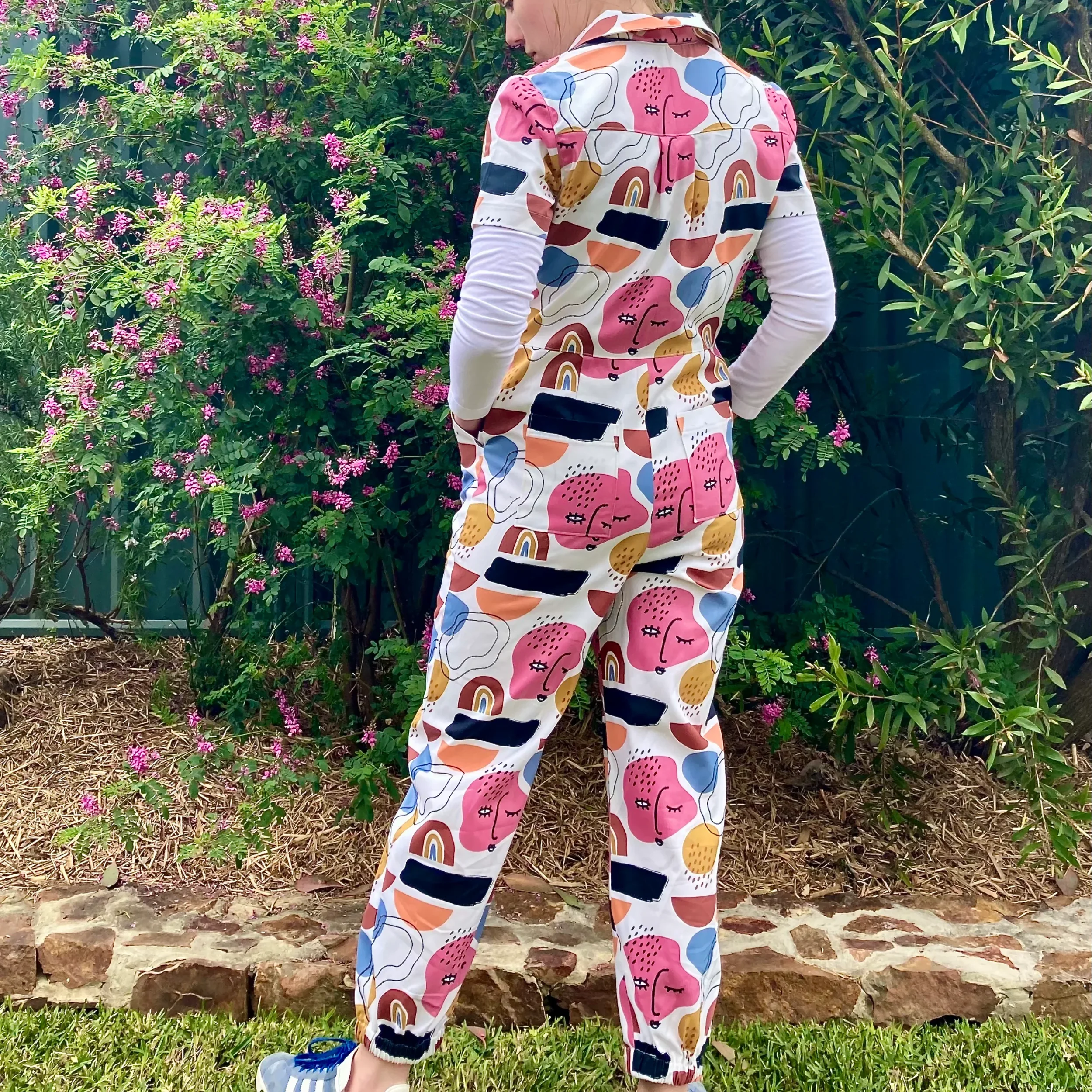 DW-Web-FaceJumpsuit-Back.webp