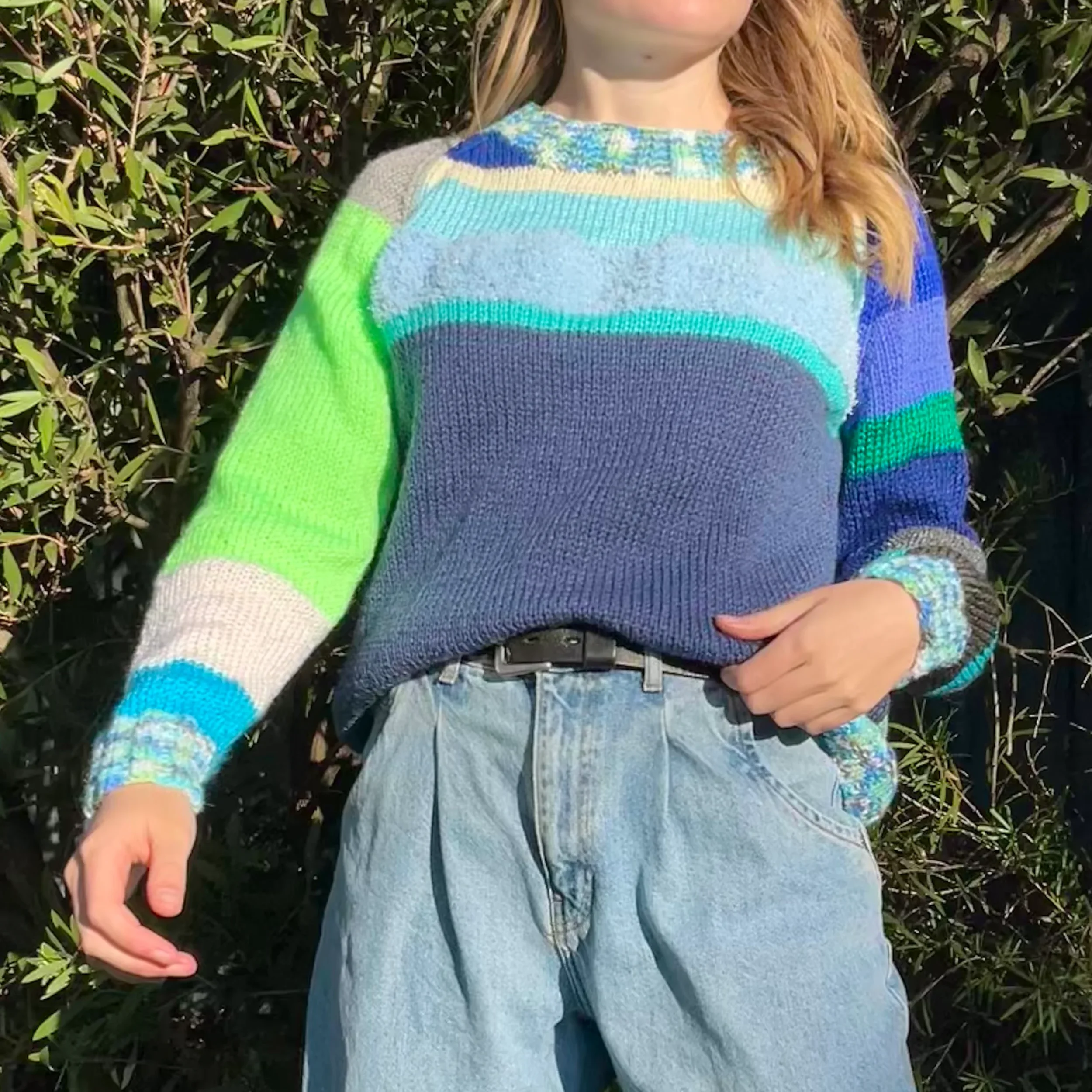 green and blue knitted sweater