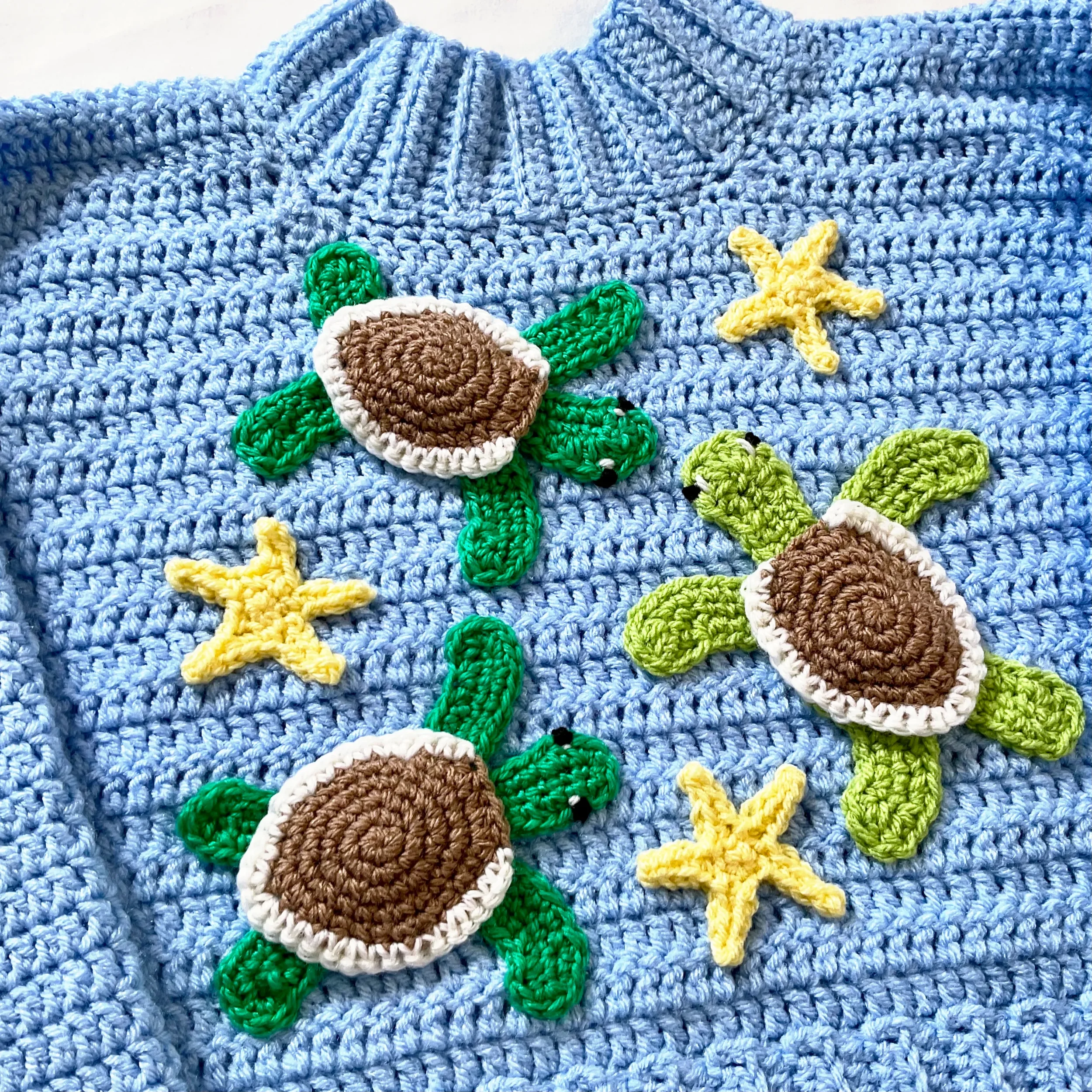 DW-Web-TurtlesSweater-Detail.webp