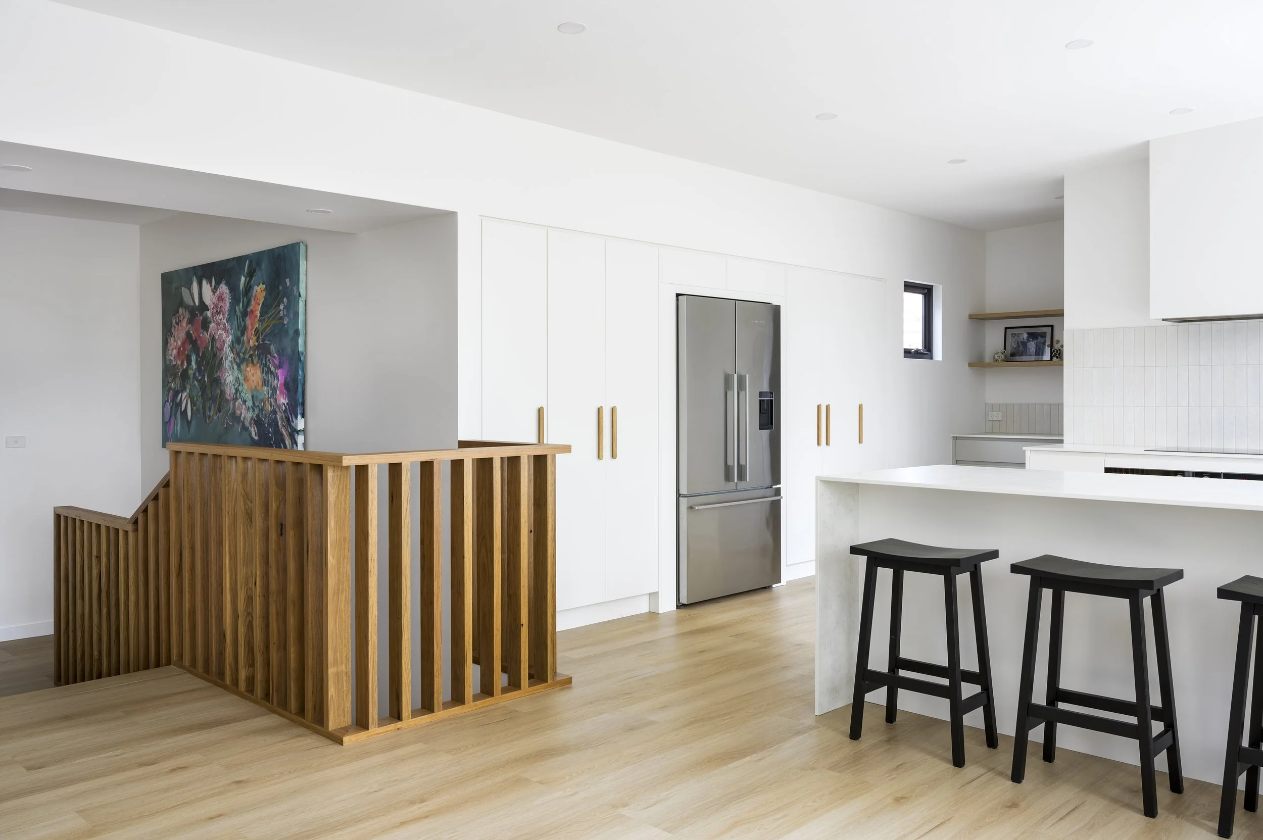 renovated extension with kitchen and handcrafted balustrade