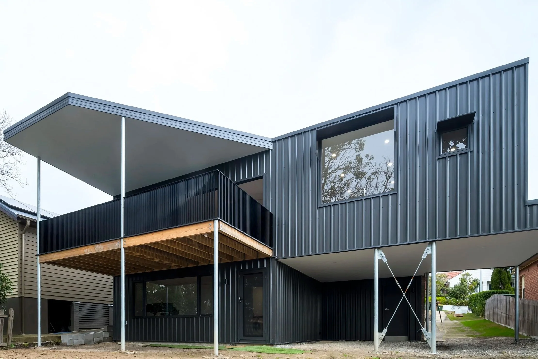 Major transformation of an old home with a new extension