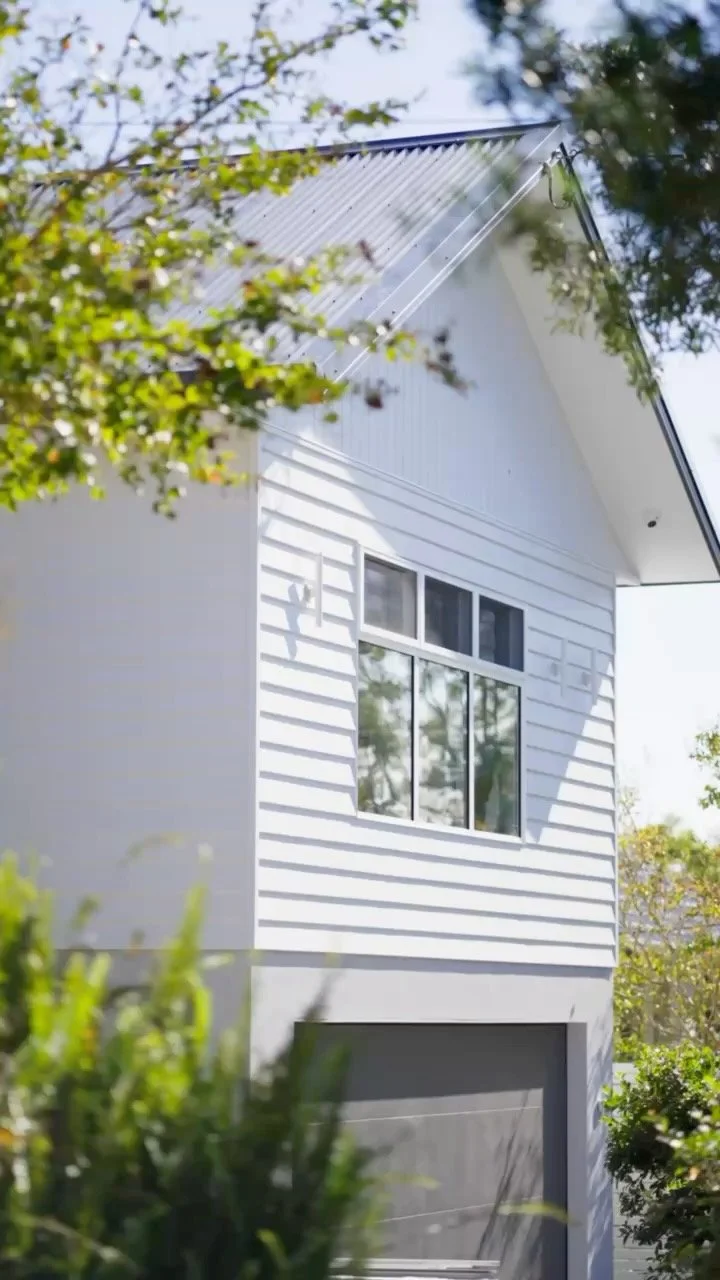 Custom home with colourbond cladding and custom handrail on the exterior deck