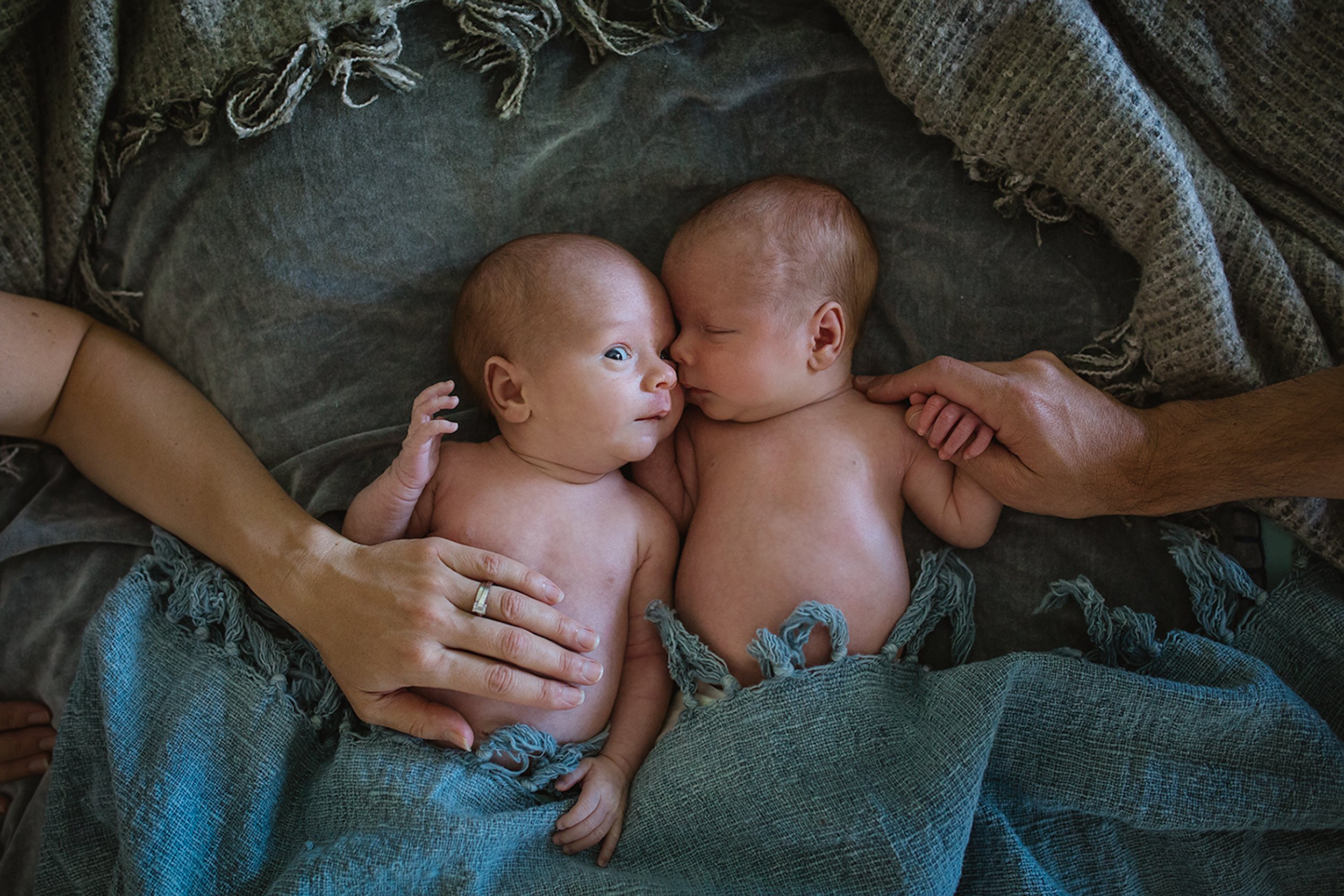 Newborn photography pricing featuring relaxed outdoor family portraits in Christchurch.