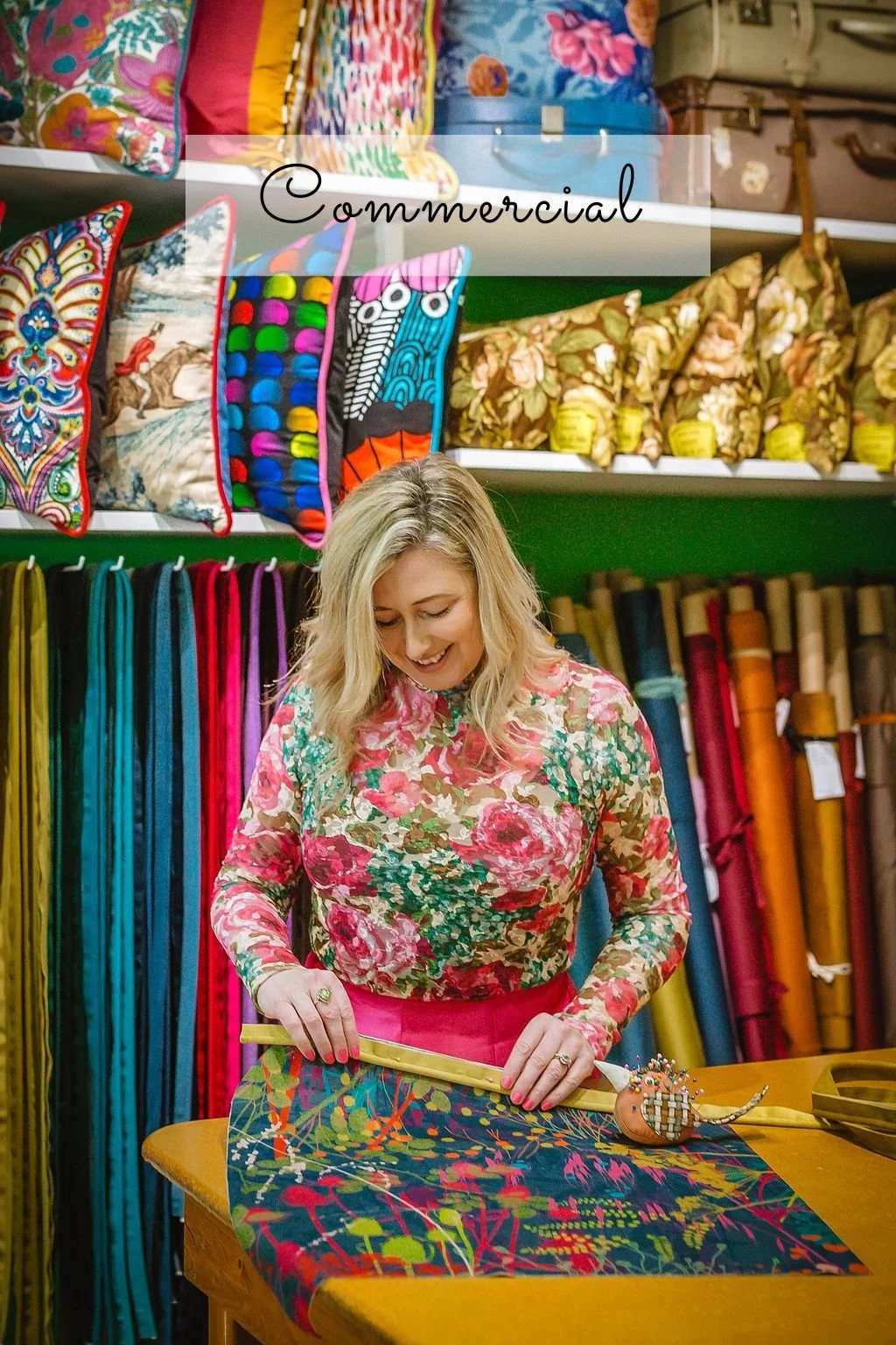 Christchurch commercial branding photographer capturing a creative business owner working in a colourful fabric studio.