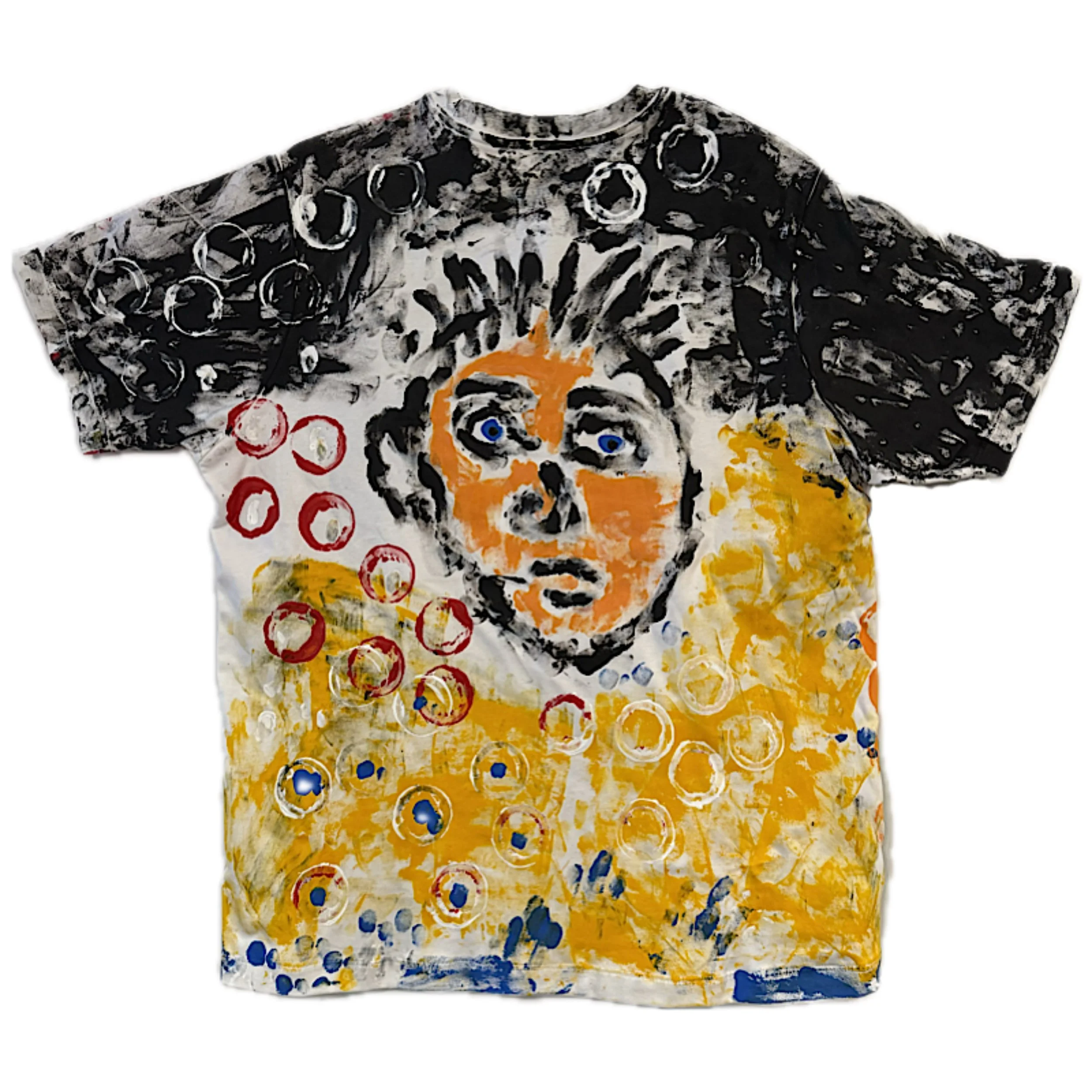 Colorful t-shirt featuring an artistic collage of a tiger's face with blue eyes, surrounded by abstract patterns and circular motifs in black, white, red, yellow, and blue.