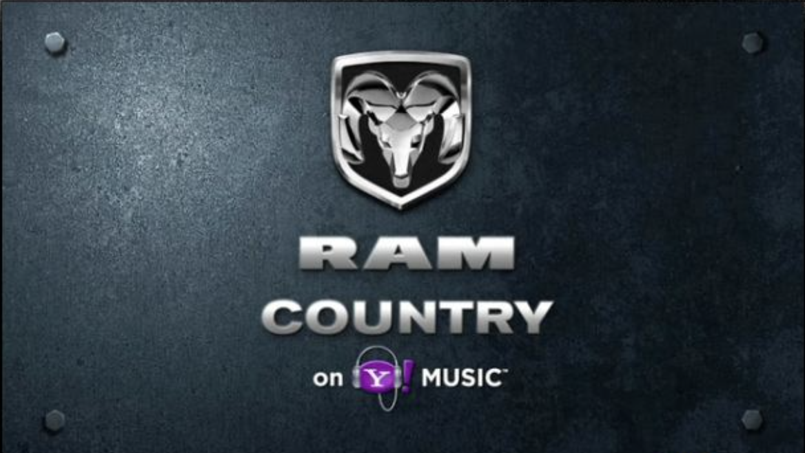 A sign with a Ram logo above the words "RAM COUNTRY" and the Yahoo Music logo below, indicating a display for RAM on Yahoo Music.