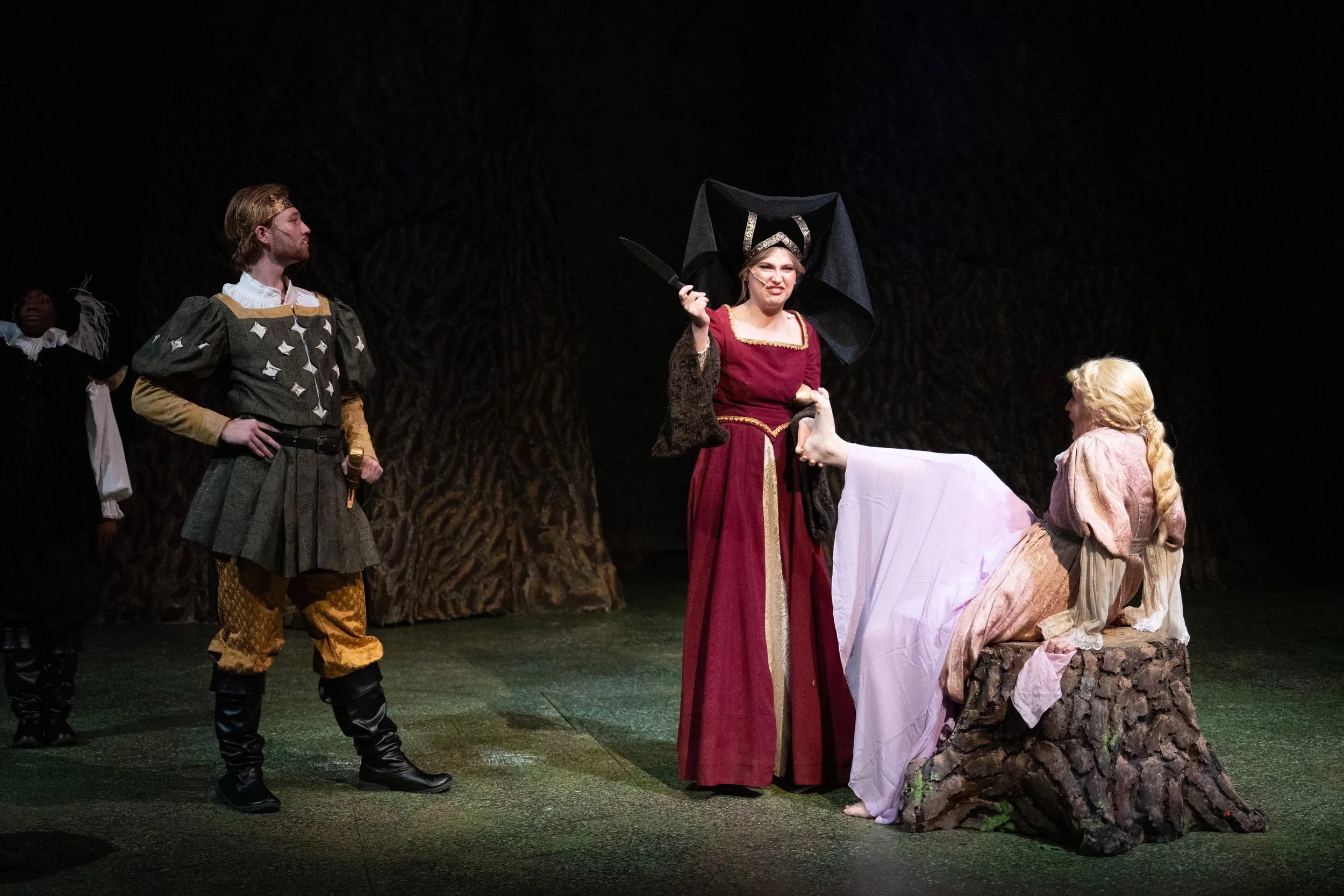 Cinderella's Stepmother cuts off her daughter's heel so it will fit in a shoe