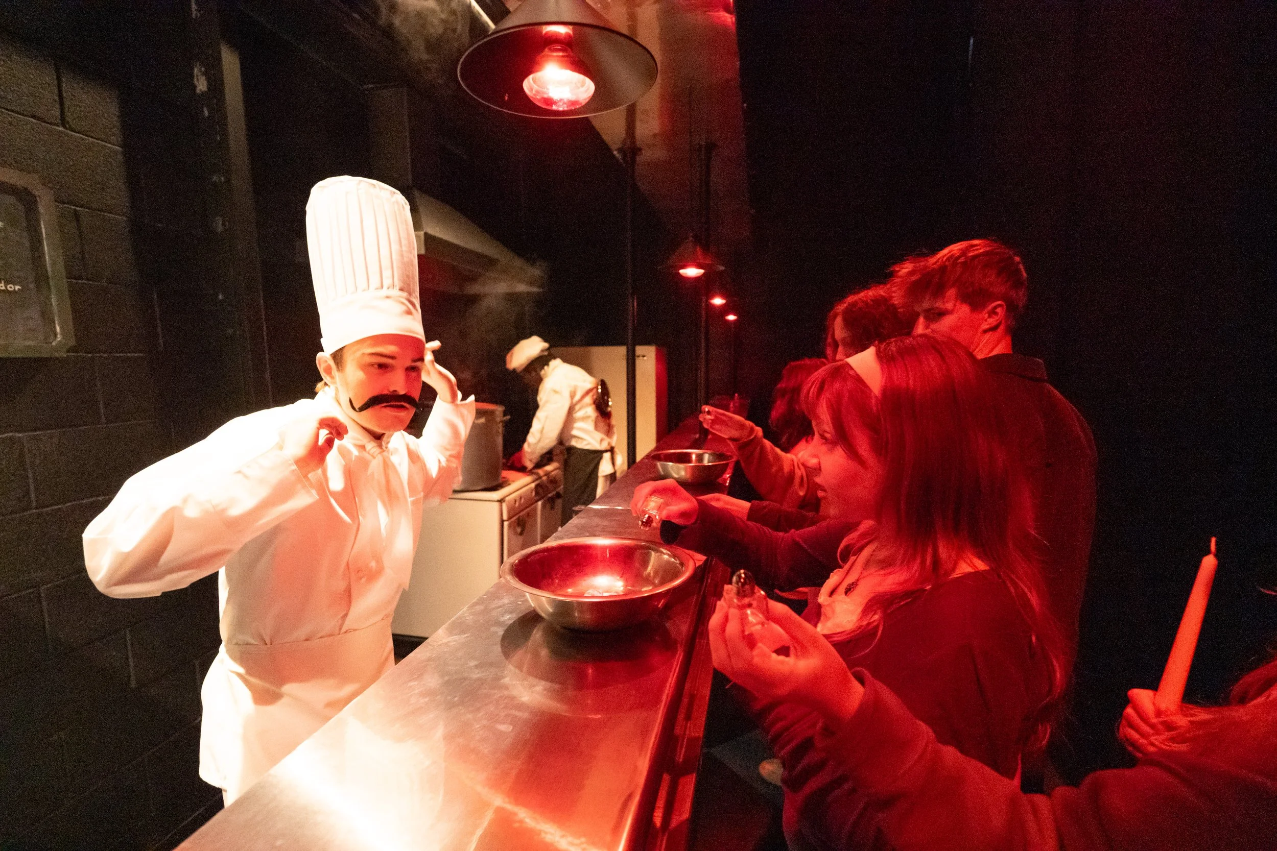 Chef LeBoucher instructs the guests to season and plate the dishes