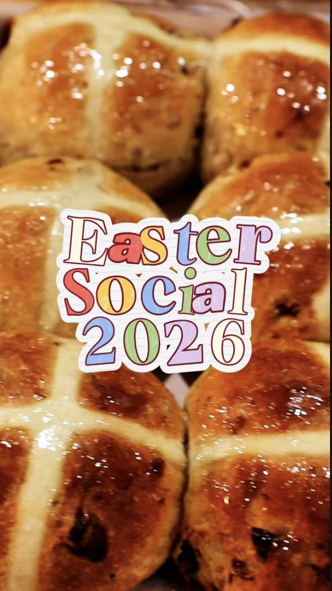 Close-up of baked bread rolls glazed with butter, with a colorful Easter Social 2026 sticker overlaid.