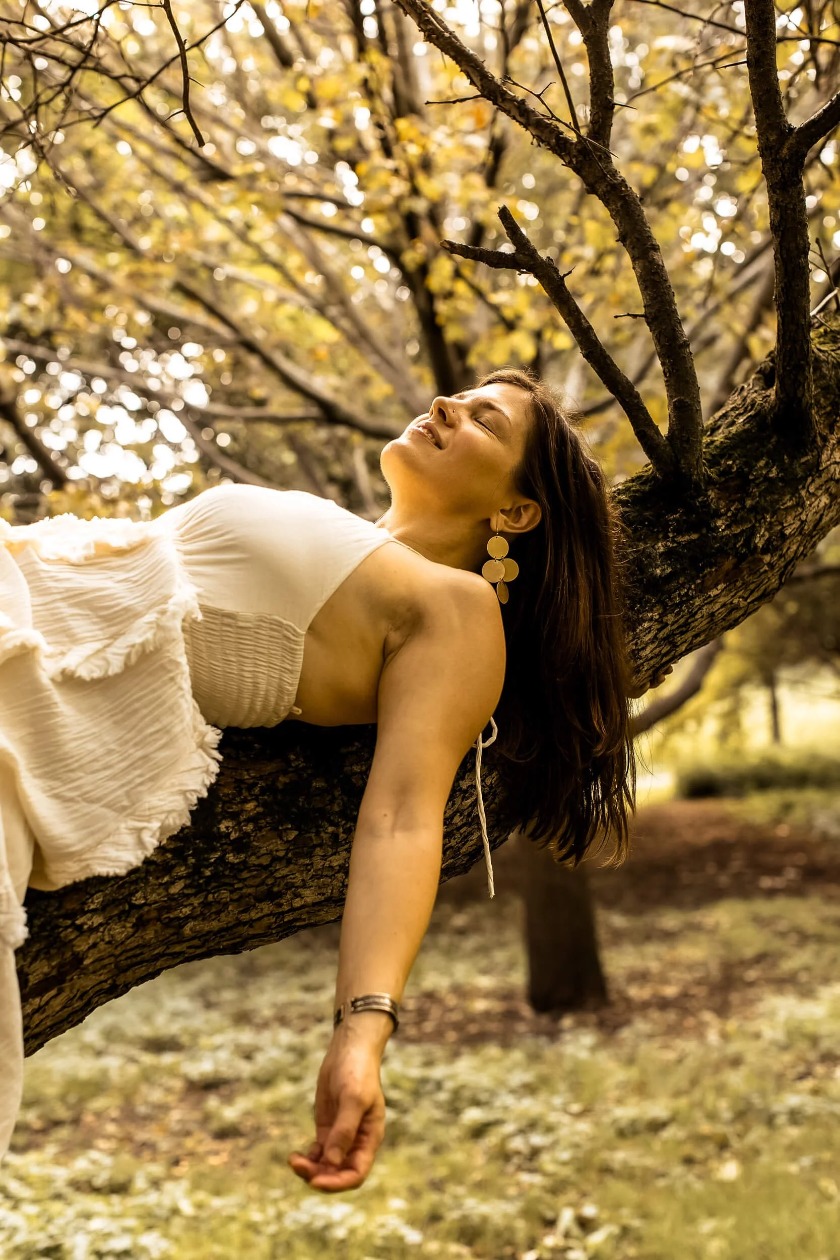 Kristi resting in a tree