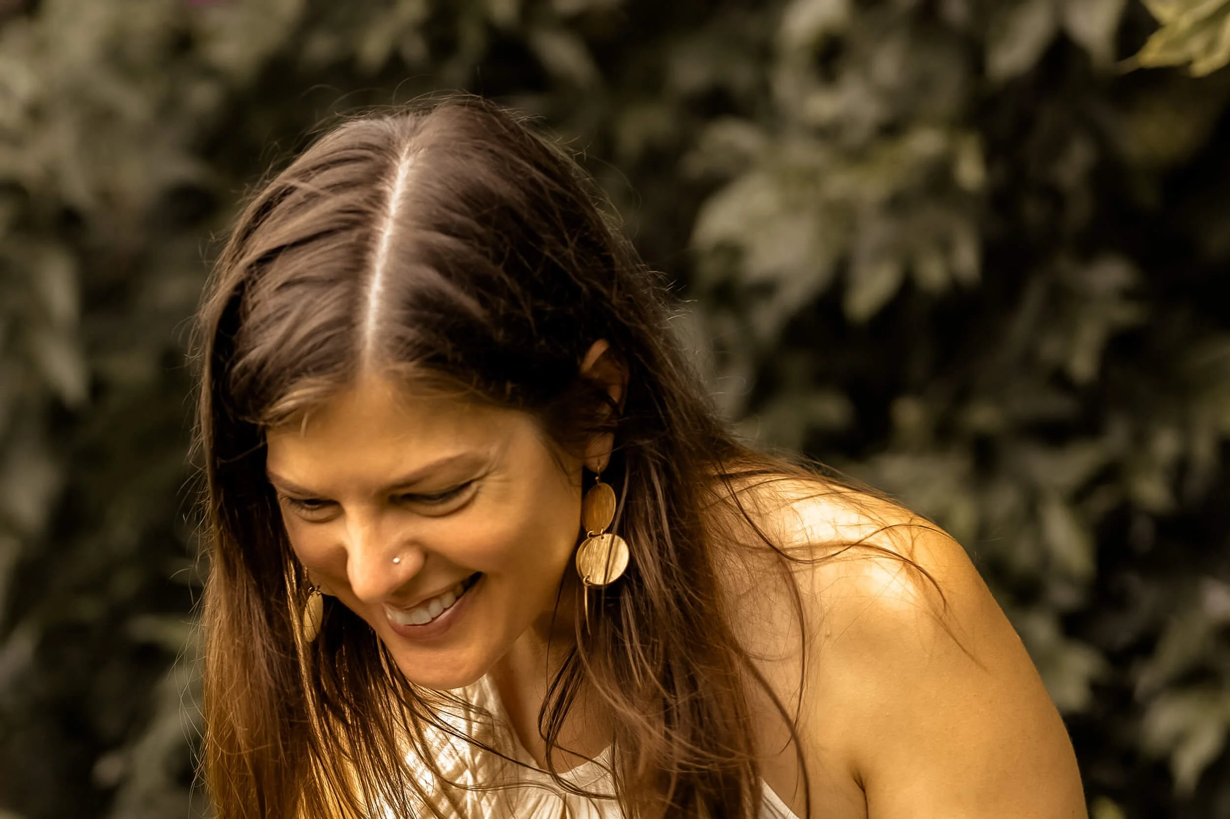 Kristi leaning over in laughter