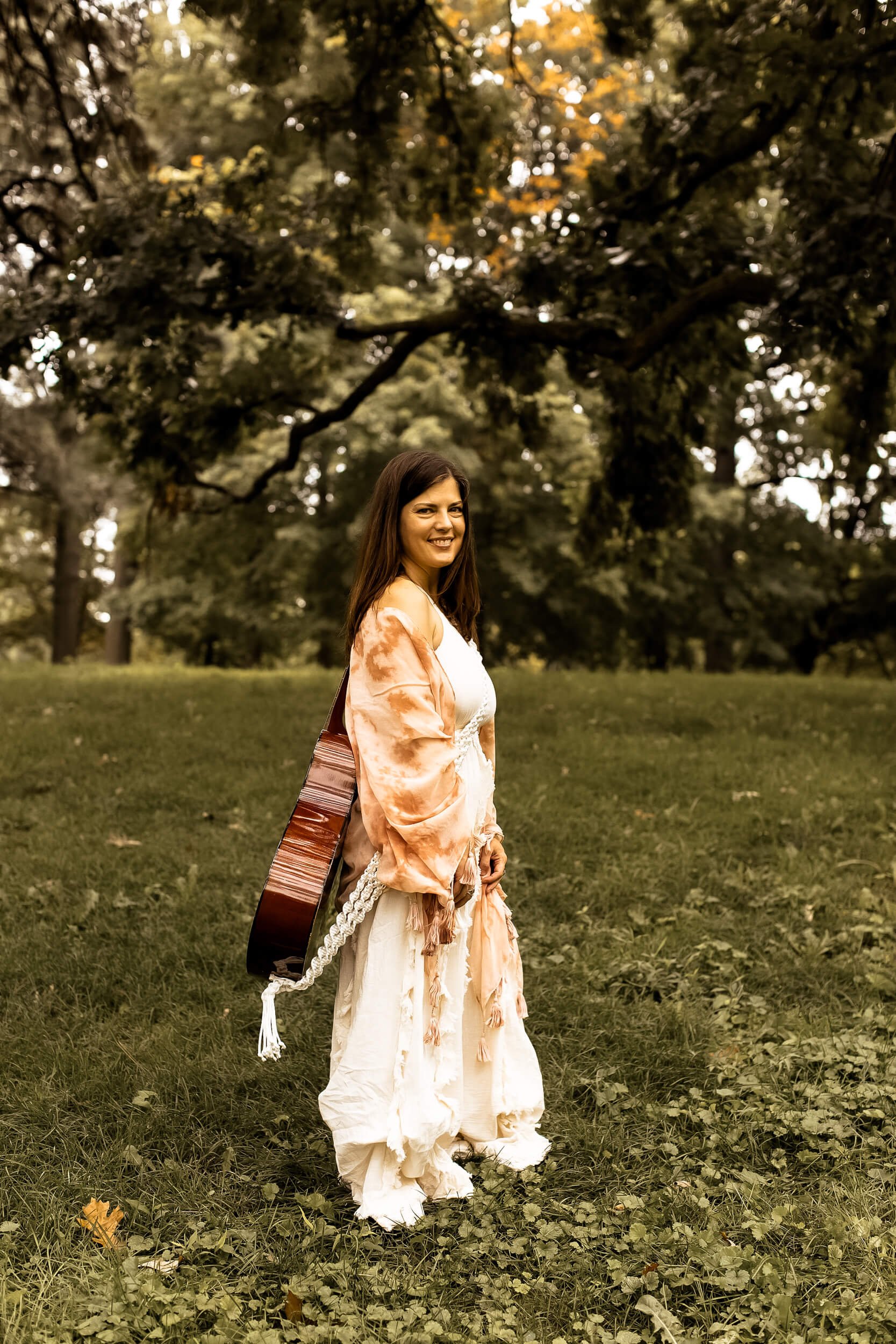 Kristi walking with a guitar (2 of 2)