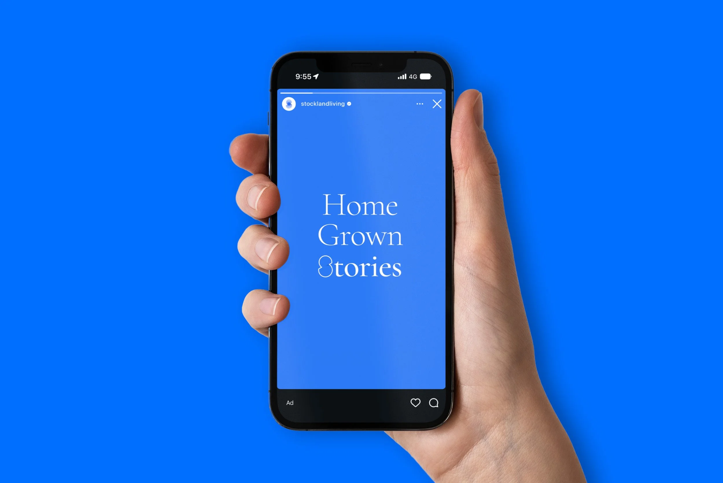 A person holding a smartphone displaying a social media post with the text 'Home Grown Stories' against a blue background.