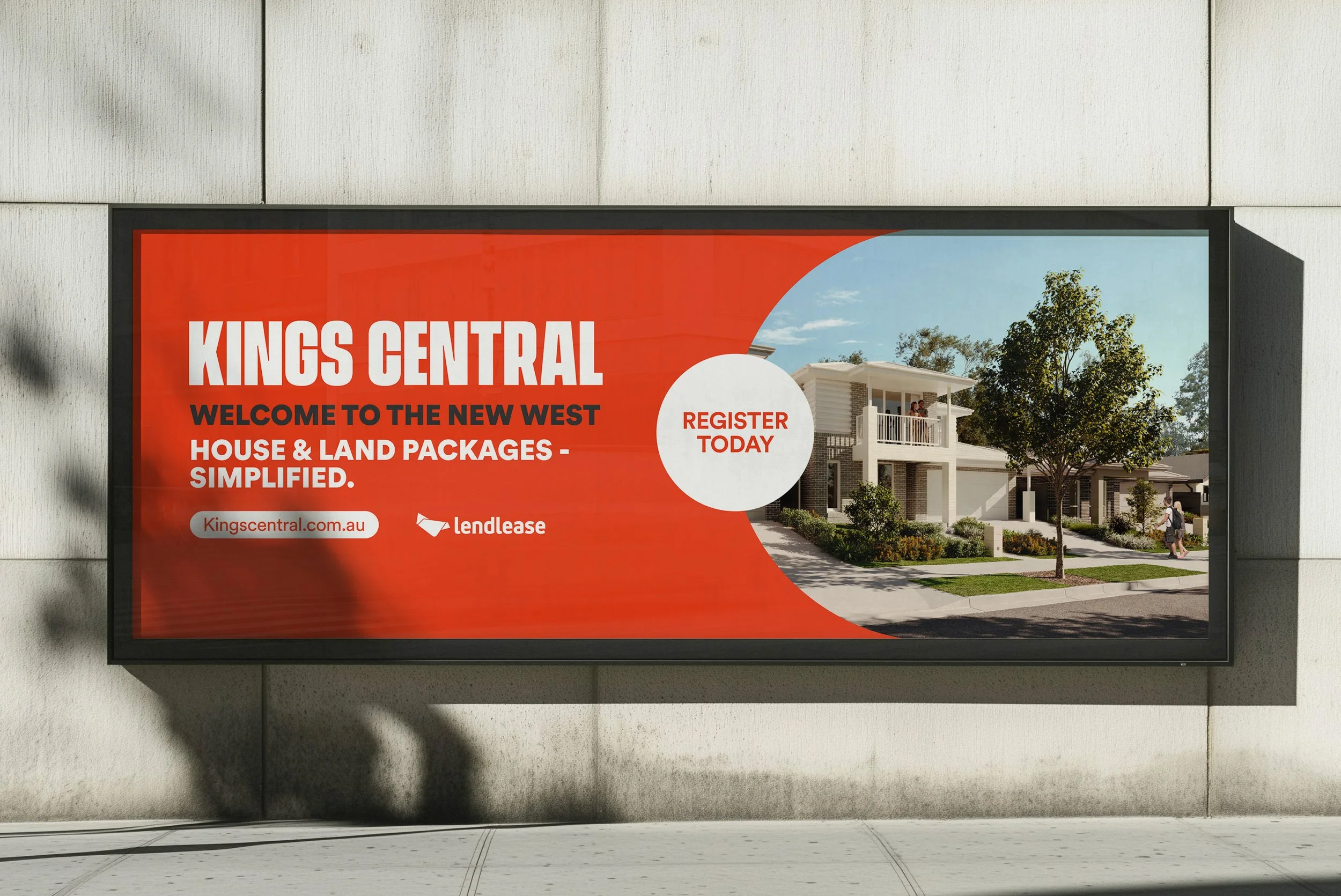 Billboard advertising Kings Central housing development with an illustration of modern houses and trees.