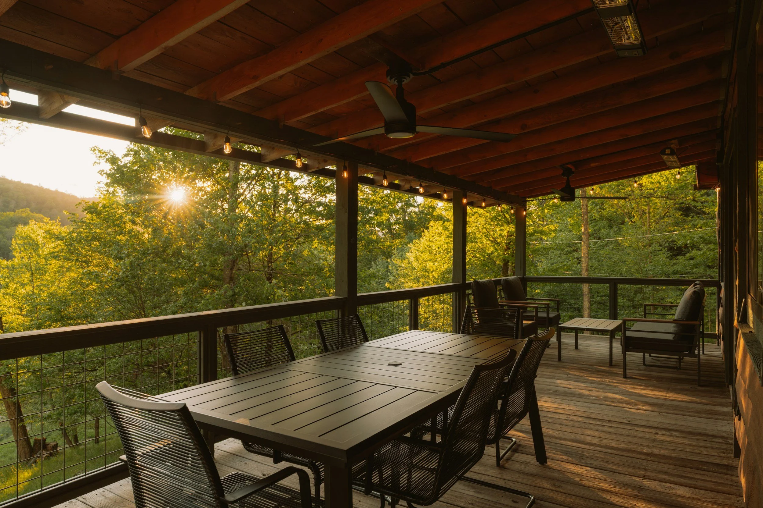 A covered backyard deck upgrade designed for year-round usage, featuring premium timber framing, modern railings, and custom lighting.