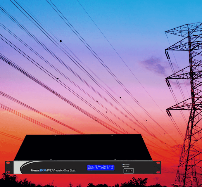 Electronic device, a GNSS precision-time clock, against colorful sunset sky with power lines and transmission tower.
