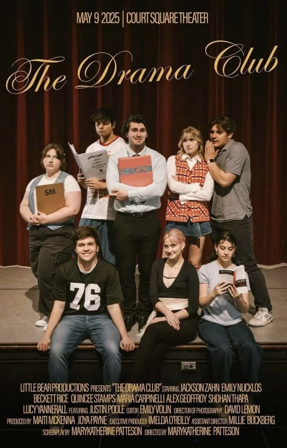 Cast photo from the play 'The Drama Club' with a red curtain background, showing nine young actors in various poses. Text on top indicates the production date, venue, and cast members.