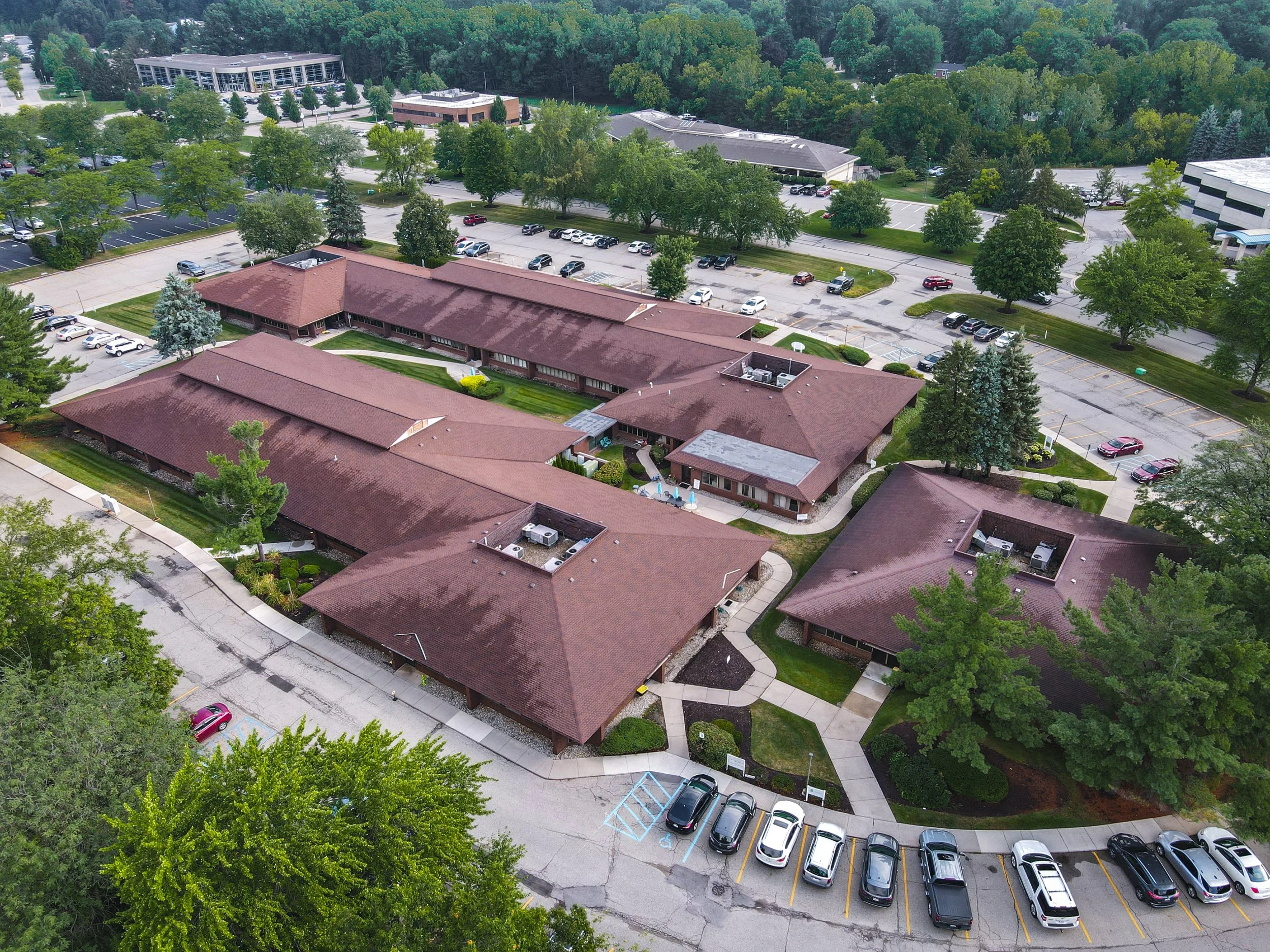 Aerial view of the commercial office complex at 751-771 Kenmoor Avenue SE in Grand Rapids, Michigan. Office suites available for lease in a centrally located business district.