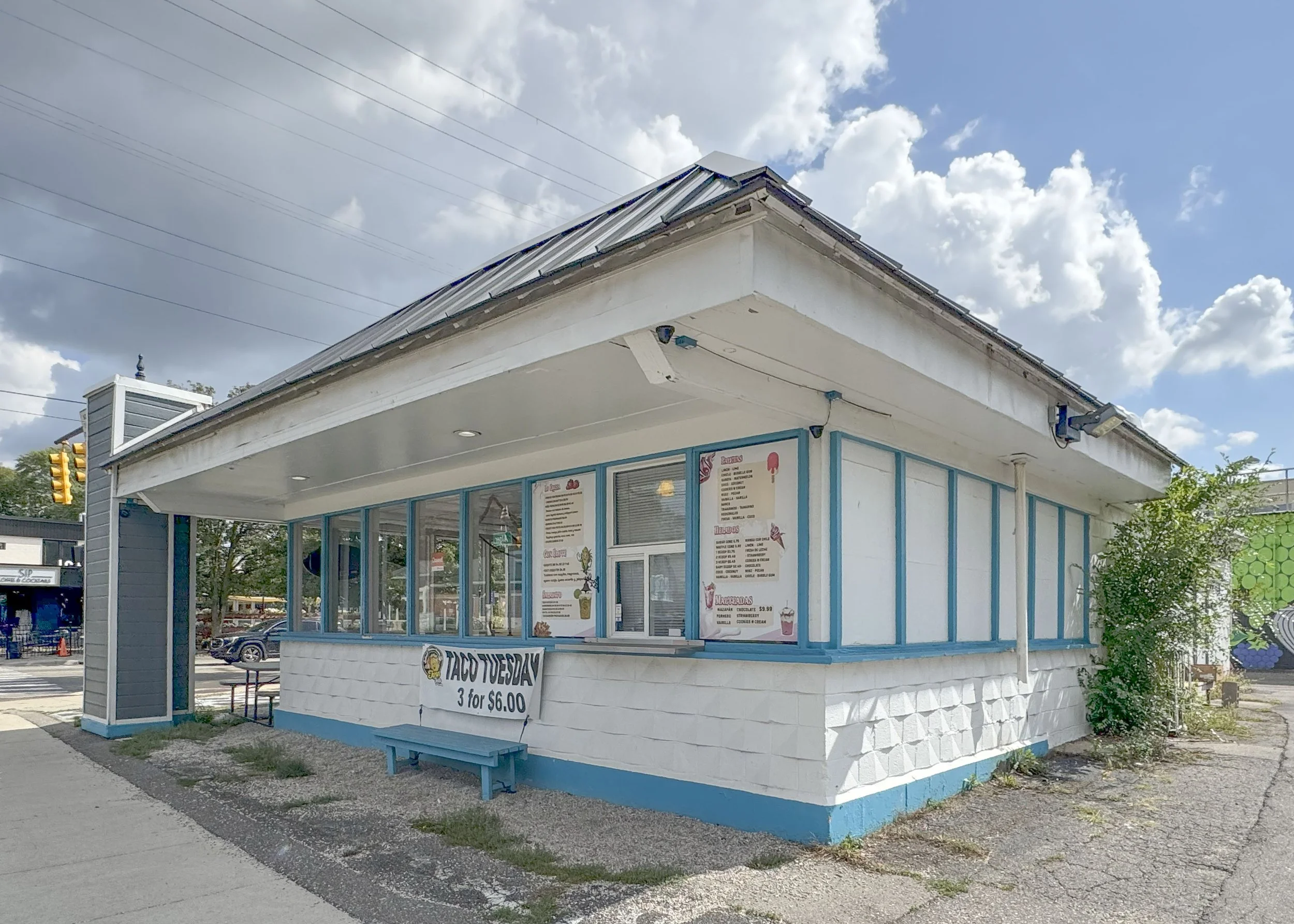 Commercial property for sale in the Alger Heights neighborhood of Grand Rapids, Michigan. Well-maintained building located in a thriving business district with strong visibility and community presence.