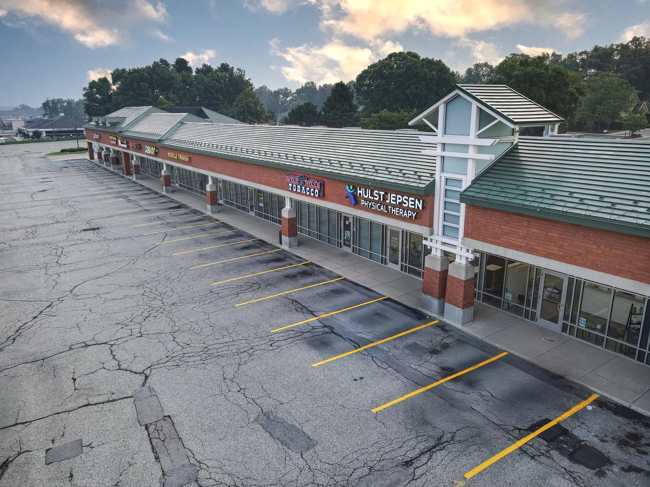 Commercial property located at 201 Marcell Drive in Rockford, Michigan. Past transaction successfully represented by Erin Peterson, demonstrating local expertise in commercial real estate throughout the Greater Grand Rapids area.