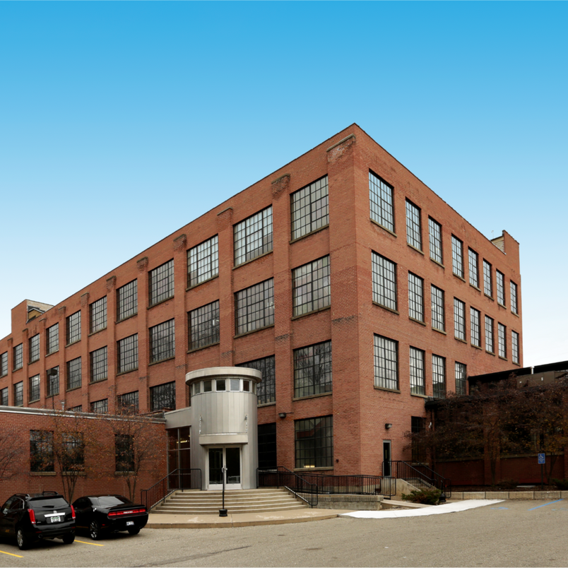 Commercial office property located at 401 Hall Street SW in Grand Rapids, Michigan. Past commercial real estate transaction successfully represented by Erin Peterson, showcasing expertise in office and mixed-use properties throughout West Michigan.