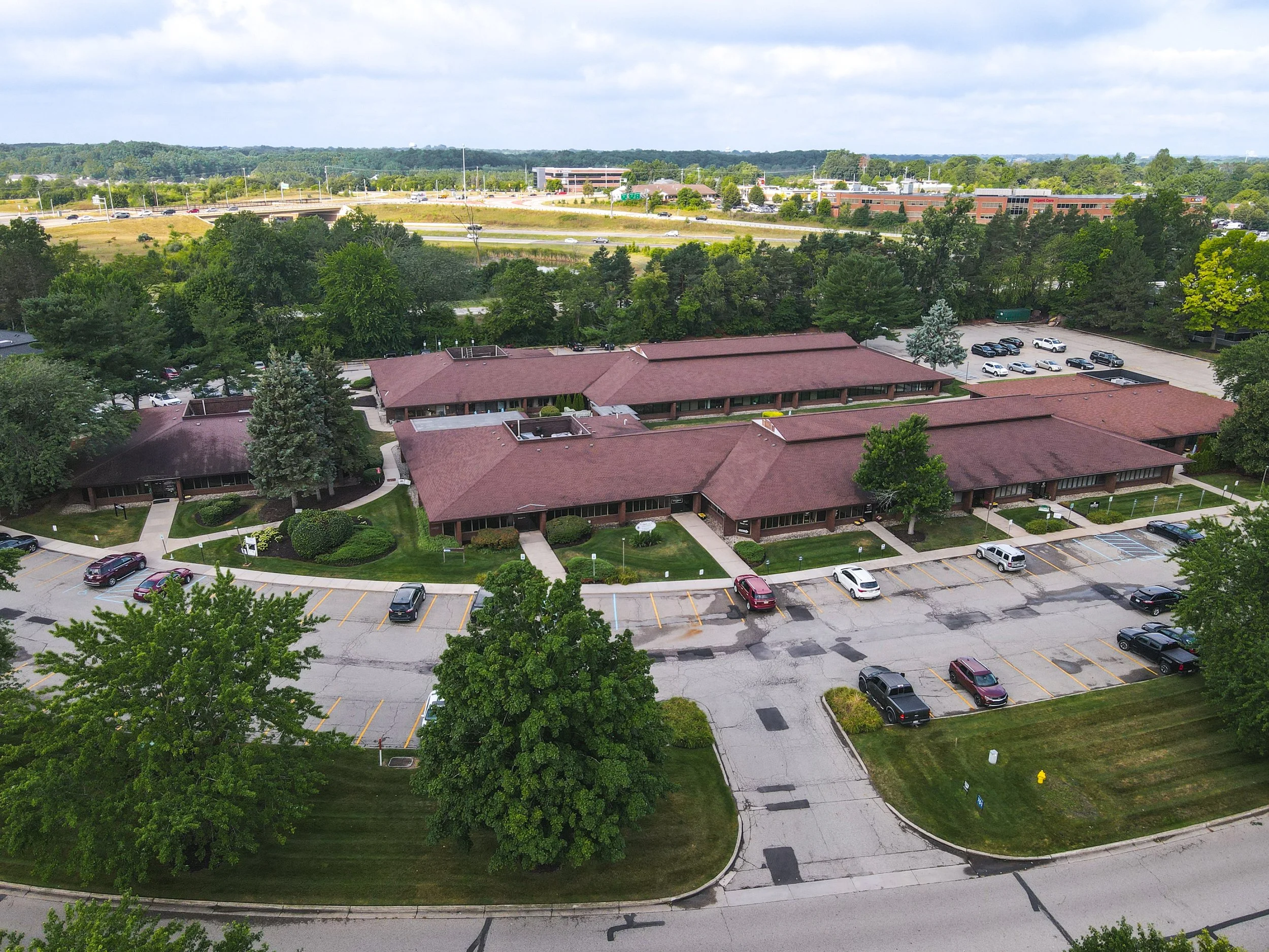 Exterior view of office space available for lease at 751-771 Kenmoor Avenue SE in Grand Rapids, Michigan. Modern office environment with convenient access to major business corridors.