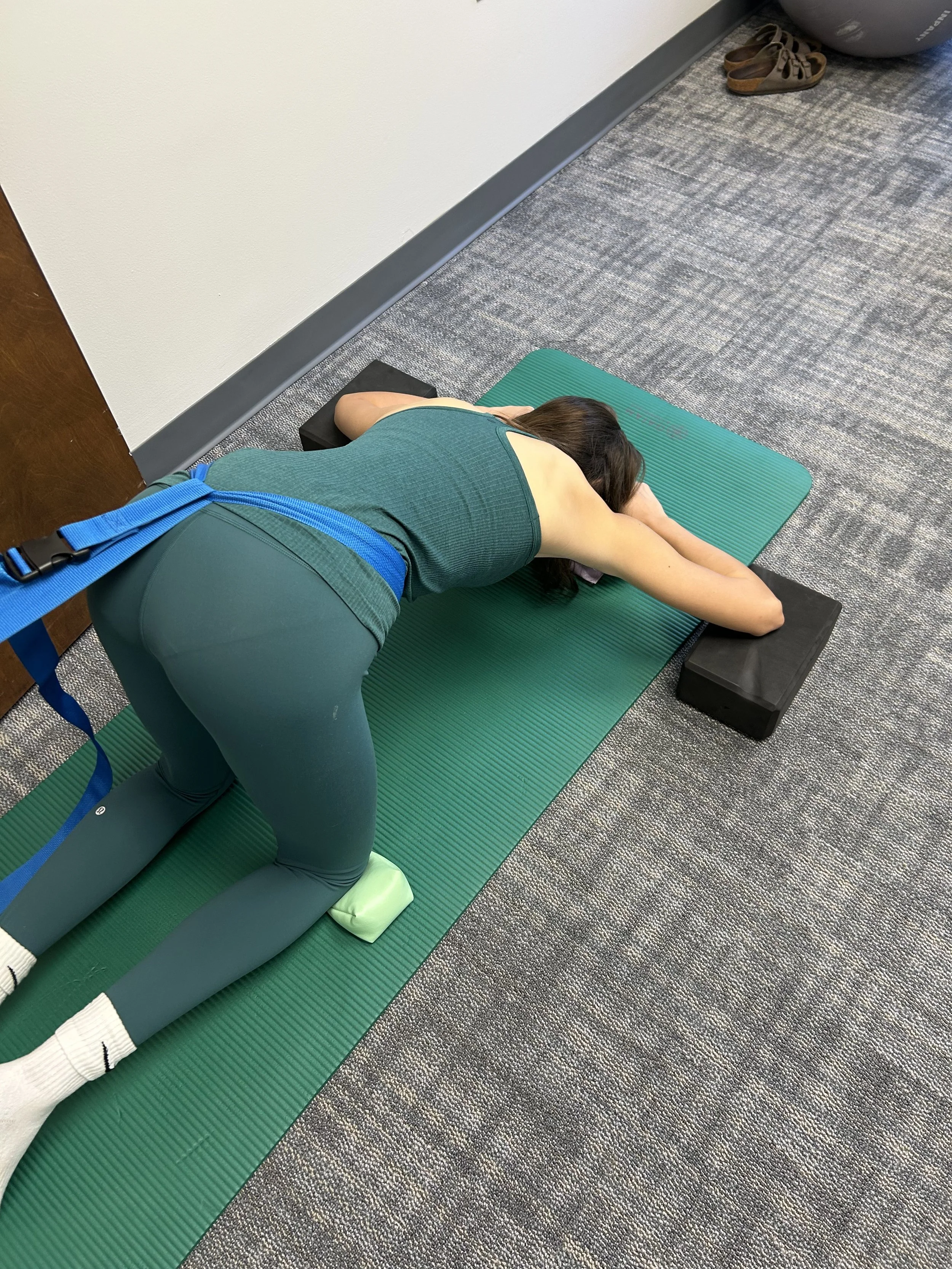 child with scoliosis doing Schroth exercise in Raleigh NC
