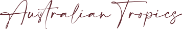Logo with the text 'Australian Tropics' in elegant script font.