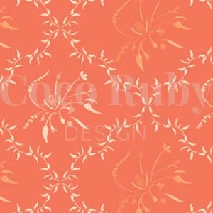 Diamond pattern of painted gum leavers and Australian native flowers on a coral background.