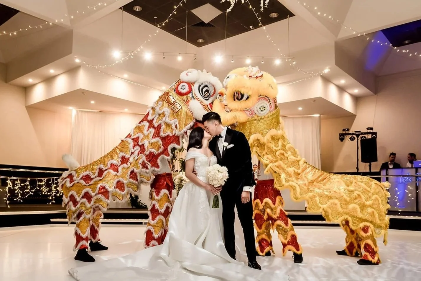 Bride and groom celebrating their wedding at Donato Reception Centre, a luxury wedding venue in Adelaide. Asian Wedding