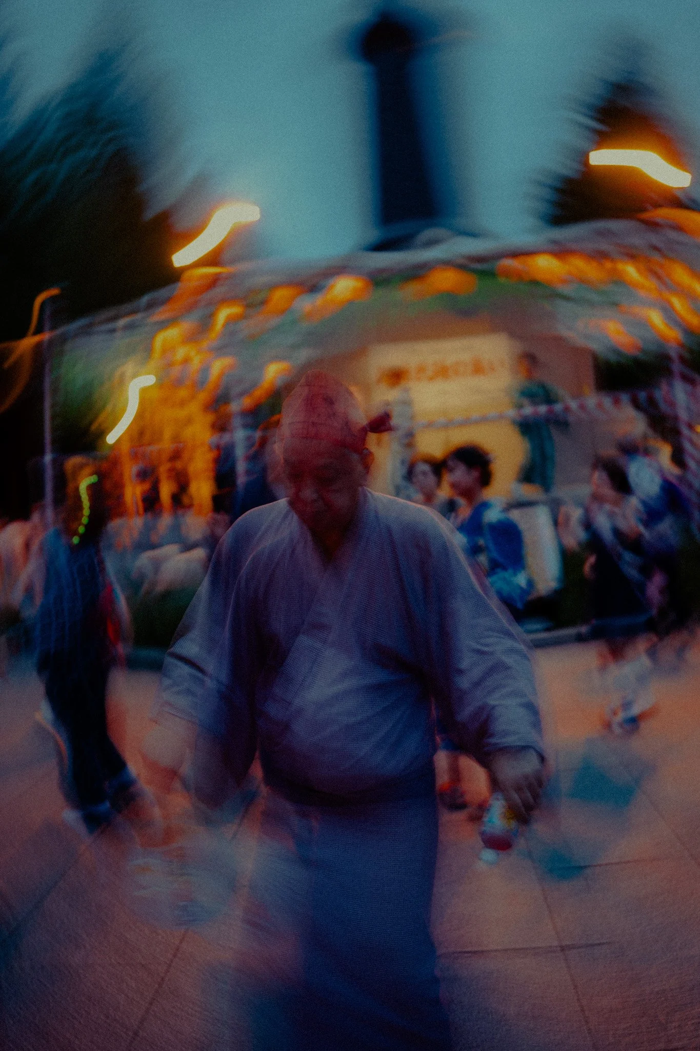 He walks toward me as if to ask: are you staying this time, or leaving with everyone else?
