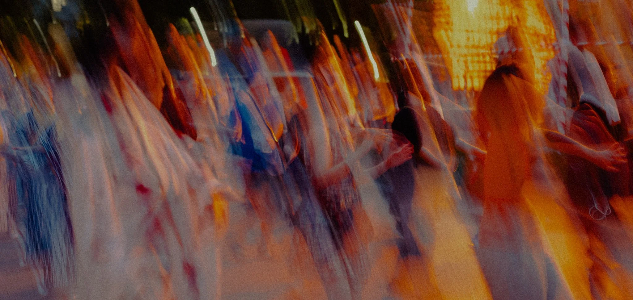 They pass through the frame the way a year passes through a house.