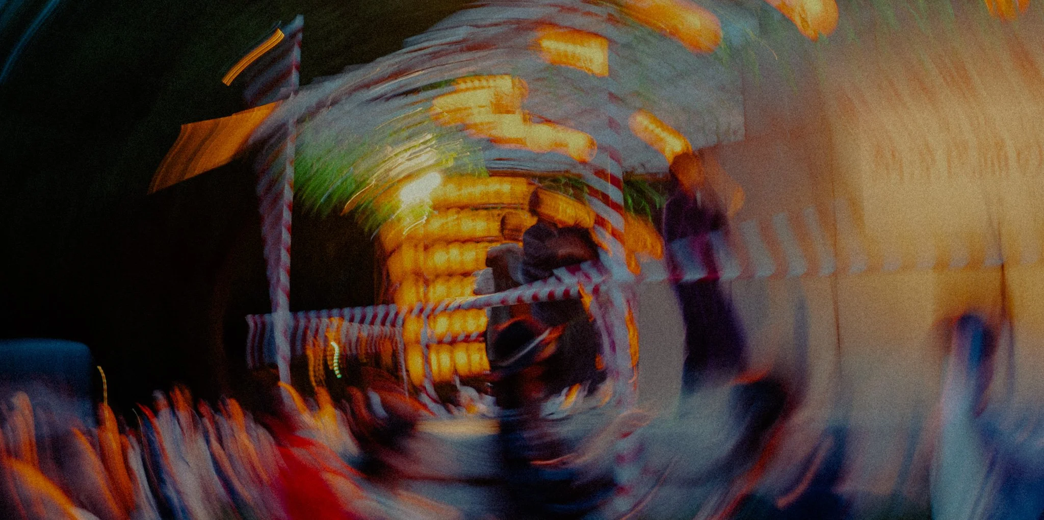 The festival turns soft at the edges, like a story my father starts and does not finish.