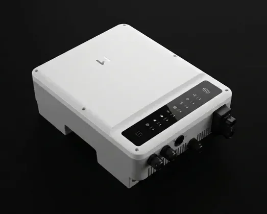 A white electronic device with a black control panel on top, placed on a black surface.