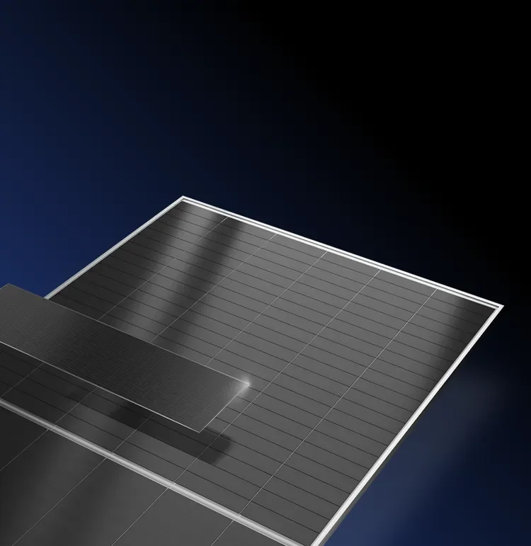 Close-up of a solar panel with dark blue sky in background.
