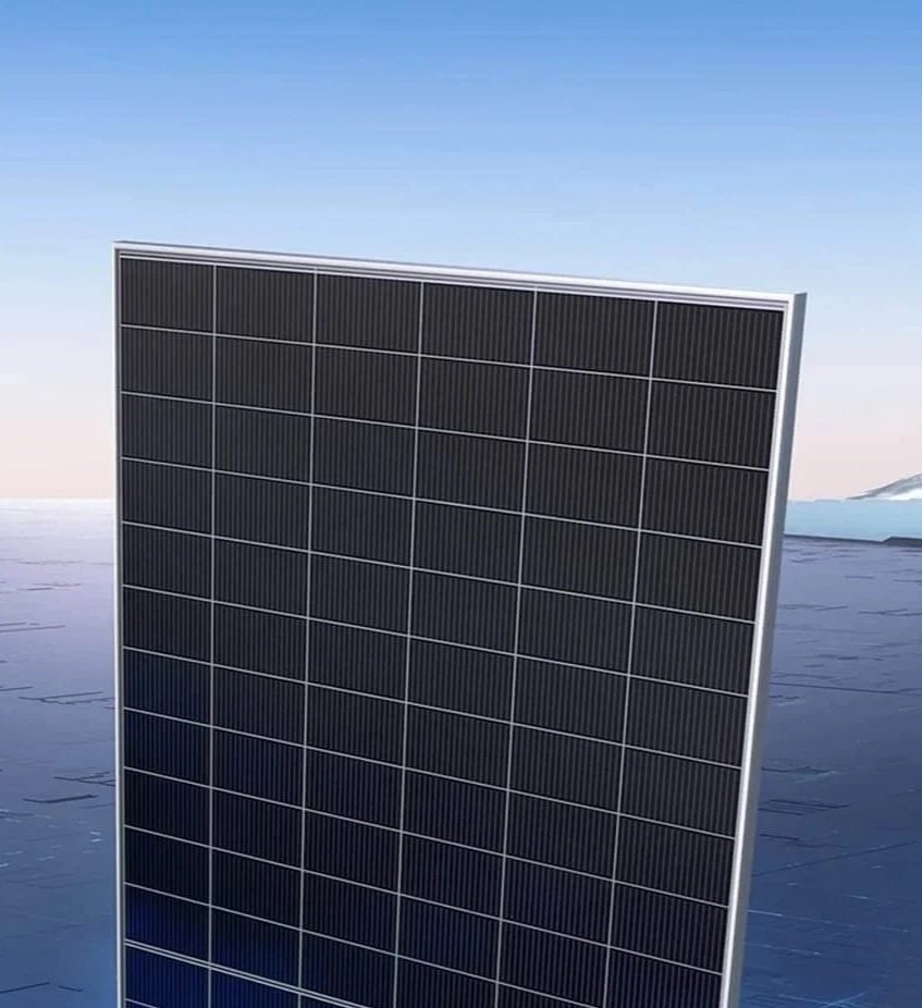 A single solar panel standing on a flat surface outdoors with a mountain landscape in the background.