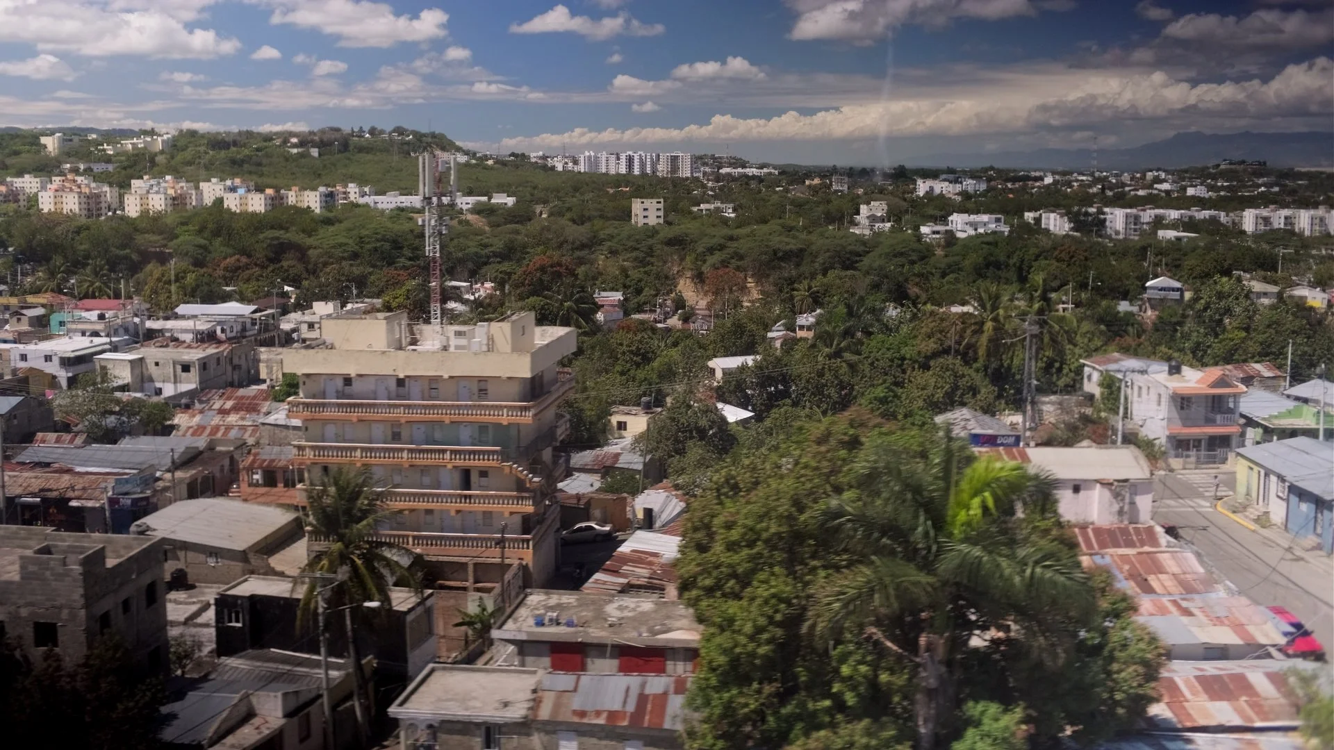 Aerial view of Santiago de los Caballeros Dominican Republic featured in My Grandfather Is Not In This Story, a documentary about migration and memory.